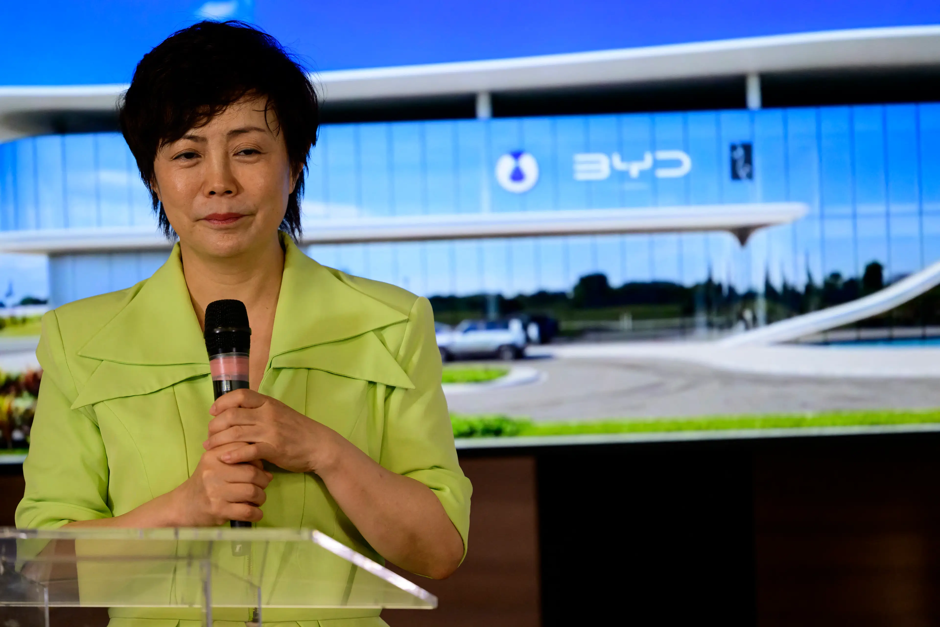 Stella Li, Executive Vice President of BYD and CEO of BYD Americas, speaks during a ceremony to announce new investments by BYD in Rio de Janeiro, Brazil Getty Images)