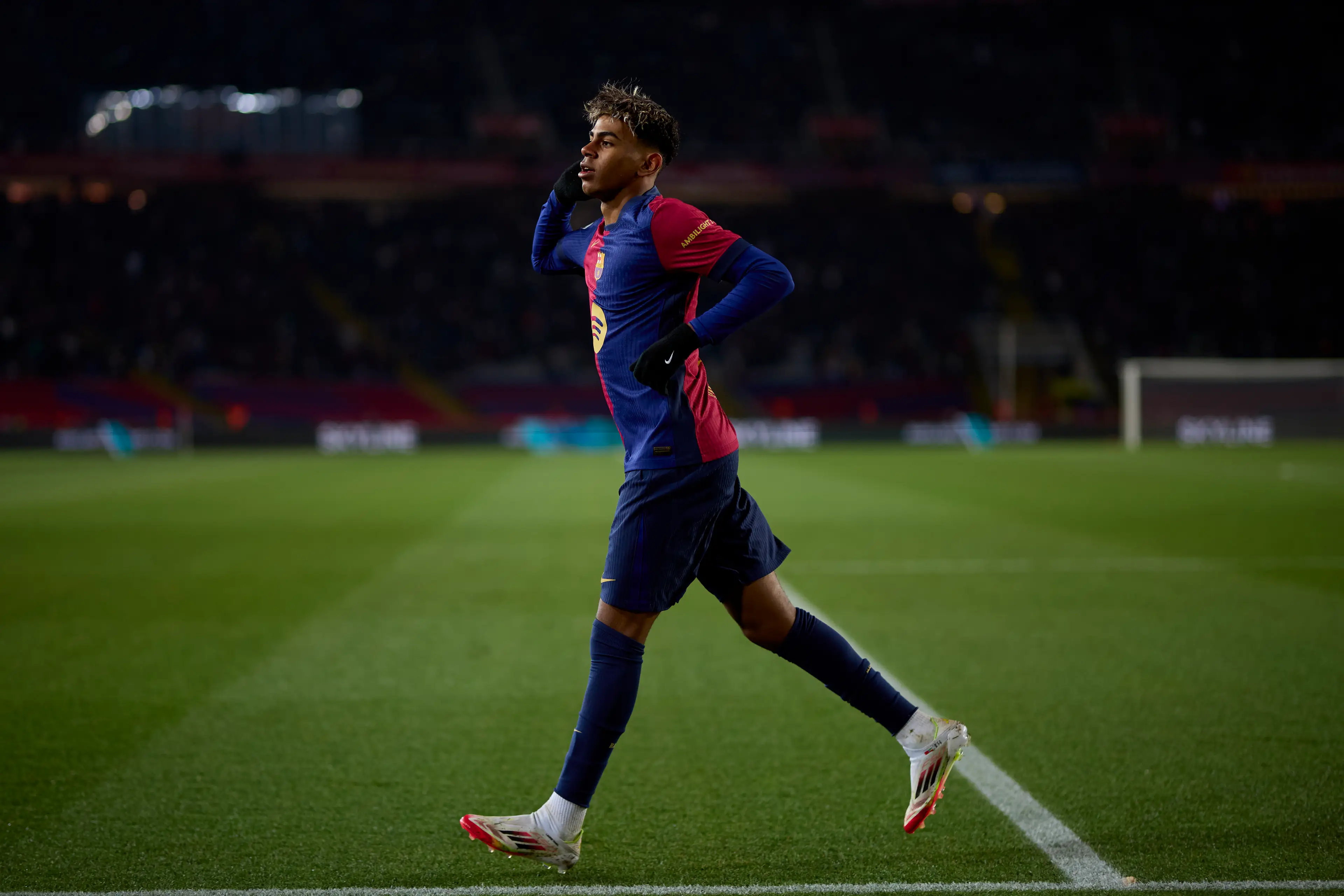 Lamine Yamal wheels away in celebration after scoring for Barcelona. Image: Getty