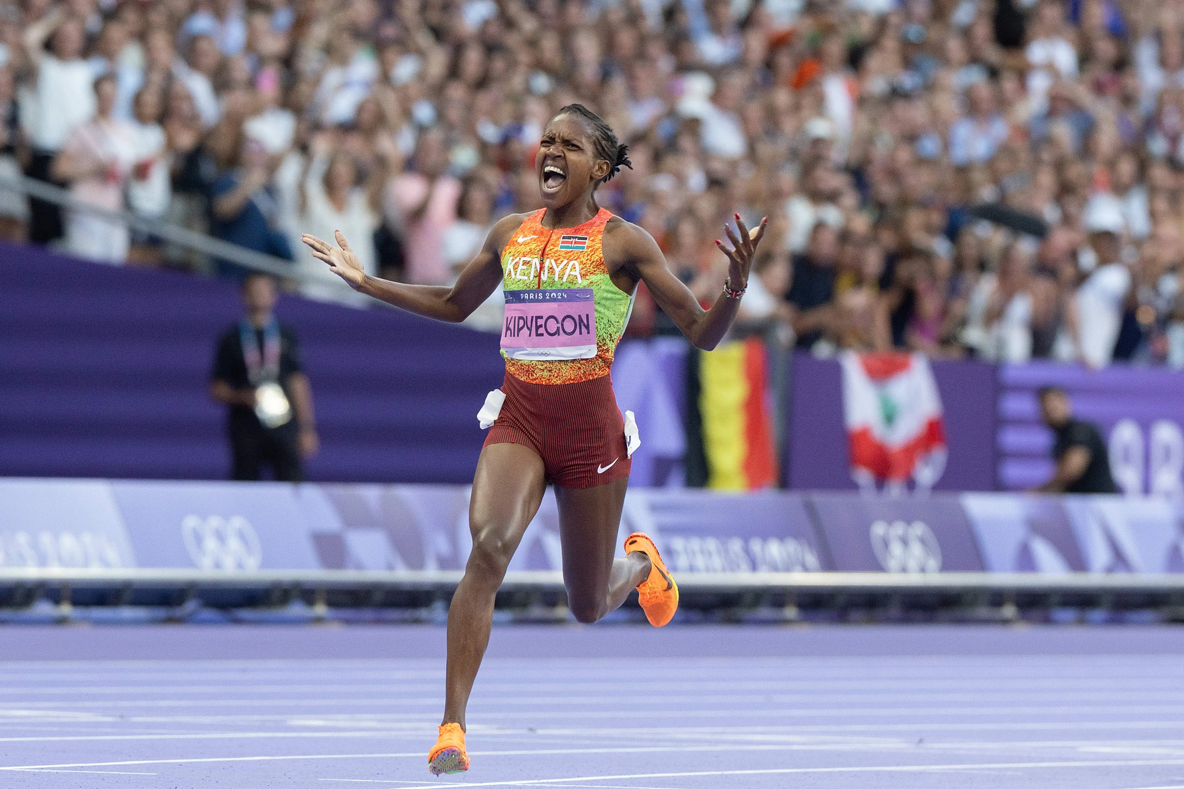 Faith Kipyegon celebrates winning gold at the 2024 Olympics. Image: Getty 