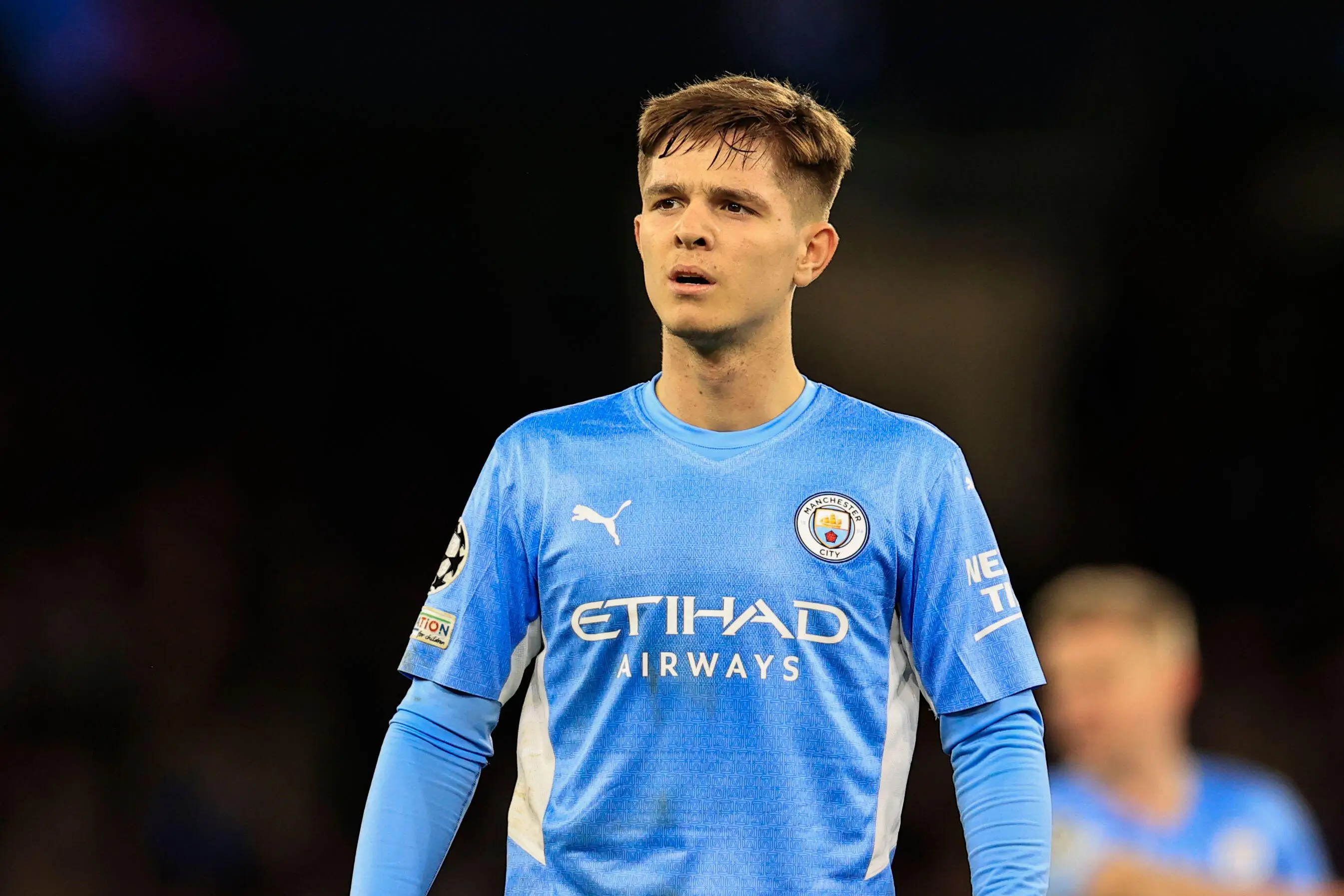 James McAtee in action for Manchester City. News Images / Alamy
