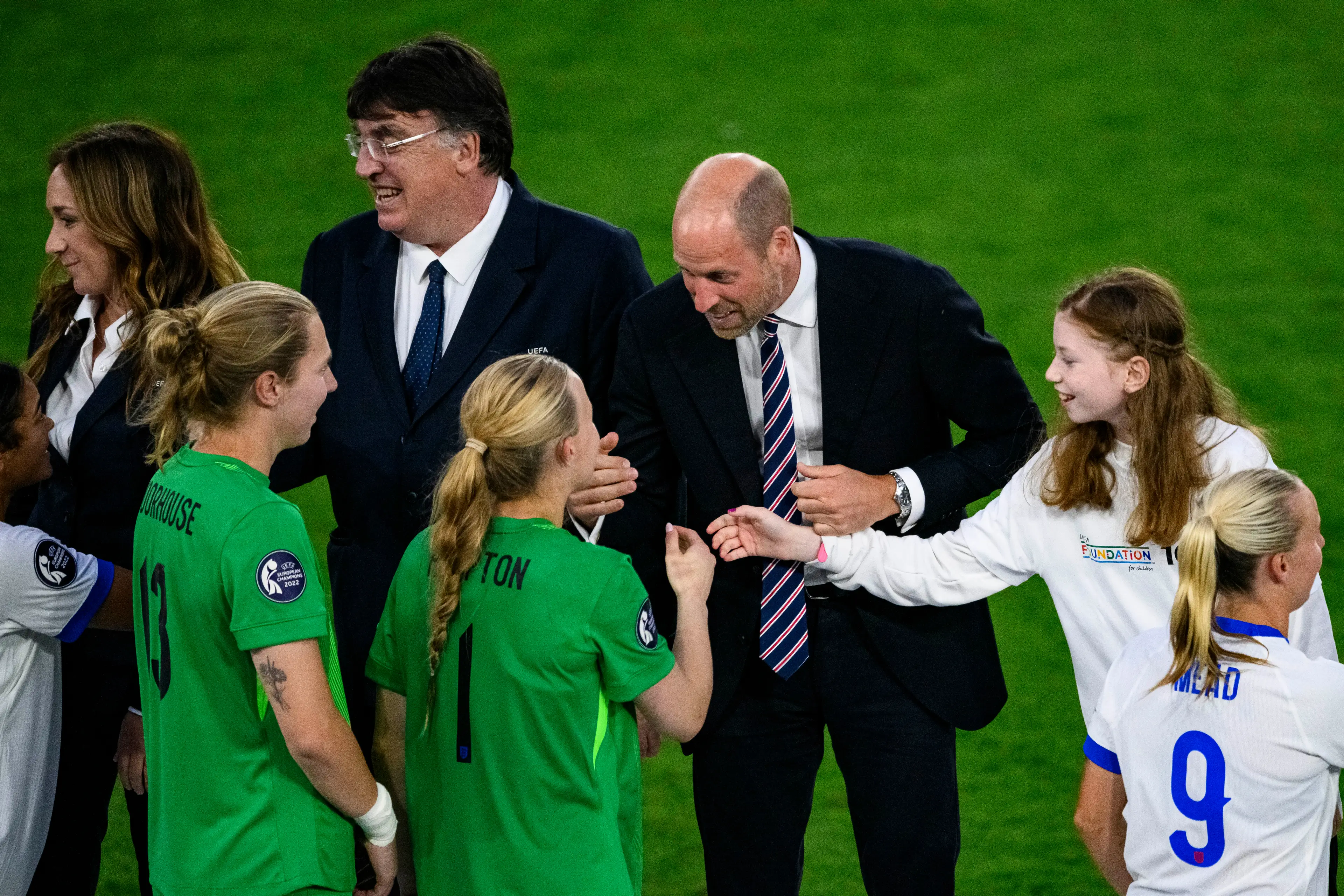 Prince William was joined by a 'mystery girl' during the trophy presentation. Image: Getty 