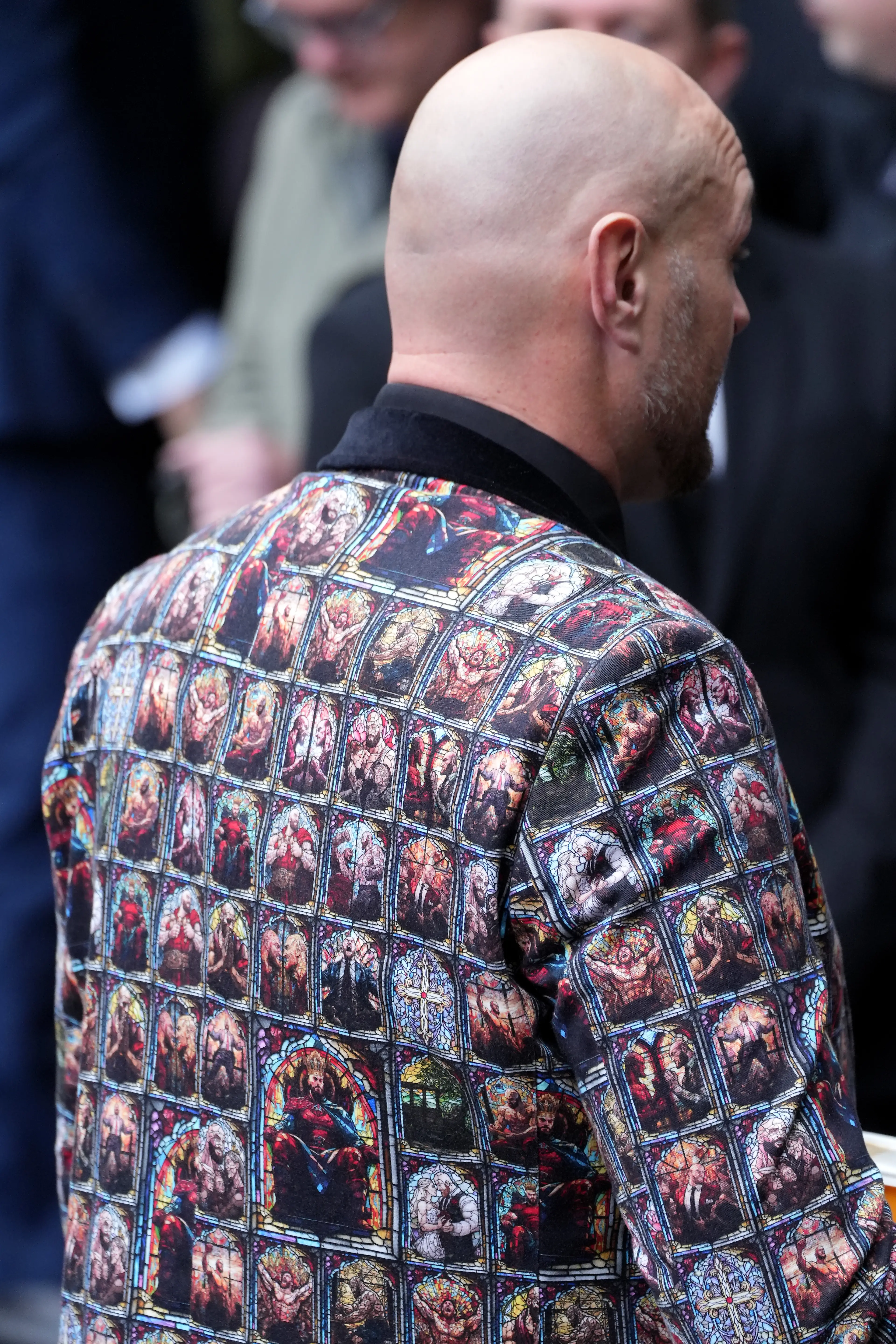 Tyson Fury's suit also featured religious iconography. Image: Getty 