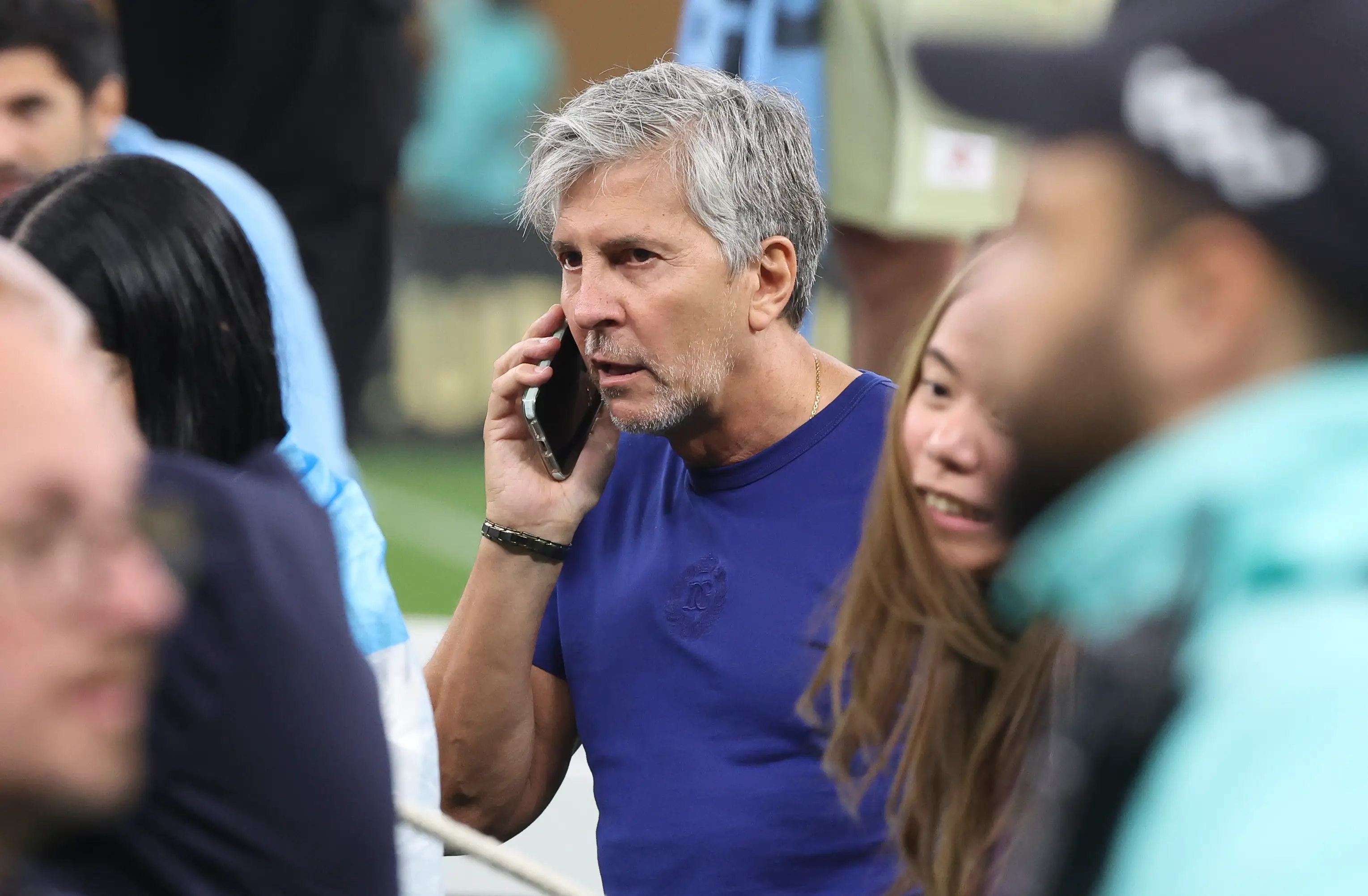 Jorge Messi on the phone during the World Cup final. Image: Getty