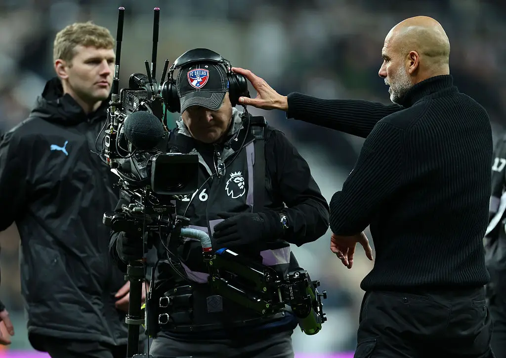 Guardiola exchanged words with a cameraman at full-time (Image: Getty)