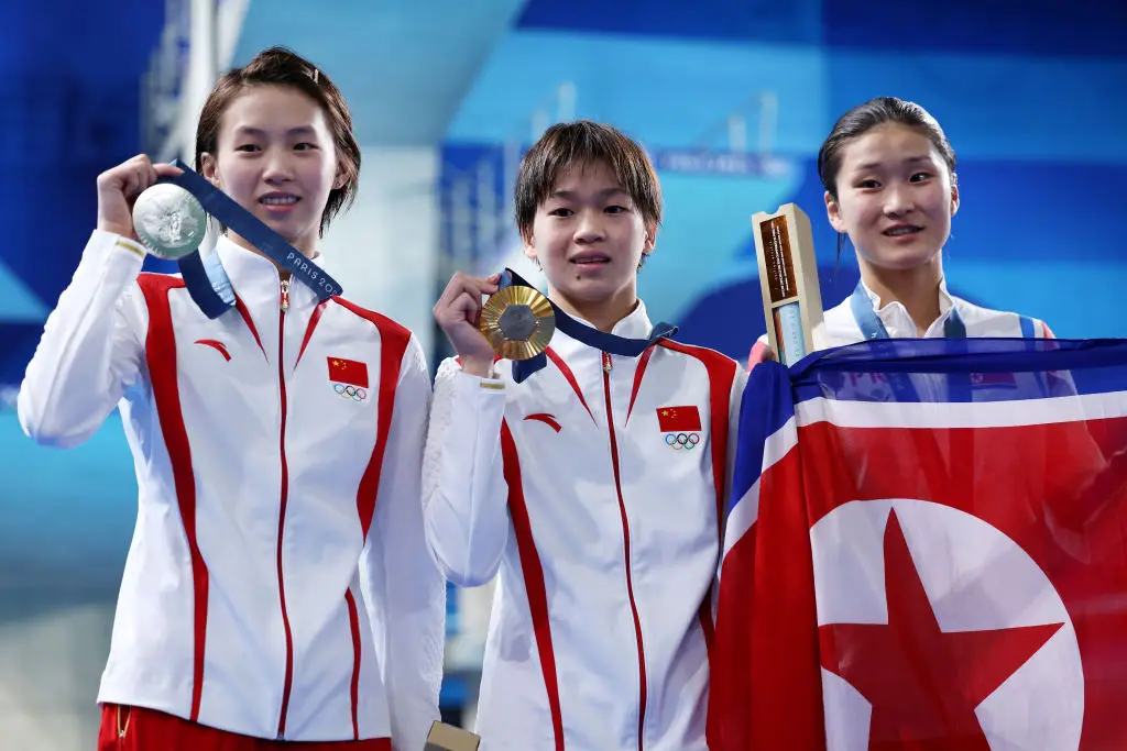 Quan Hongchan celebrates after winning gold in the women's 10m platform at Paris 2024 (Image: Getty)