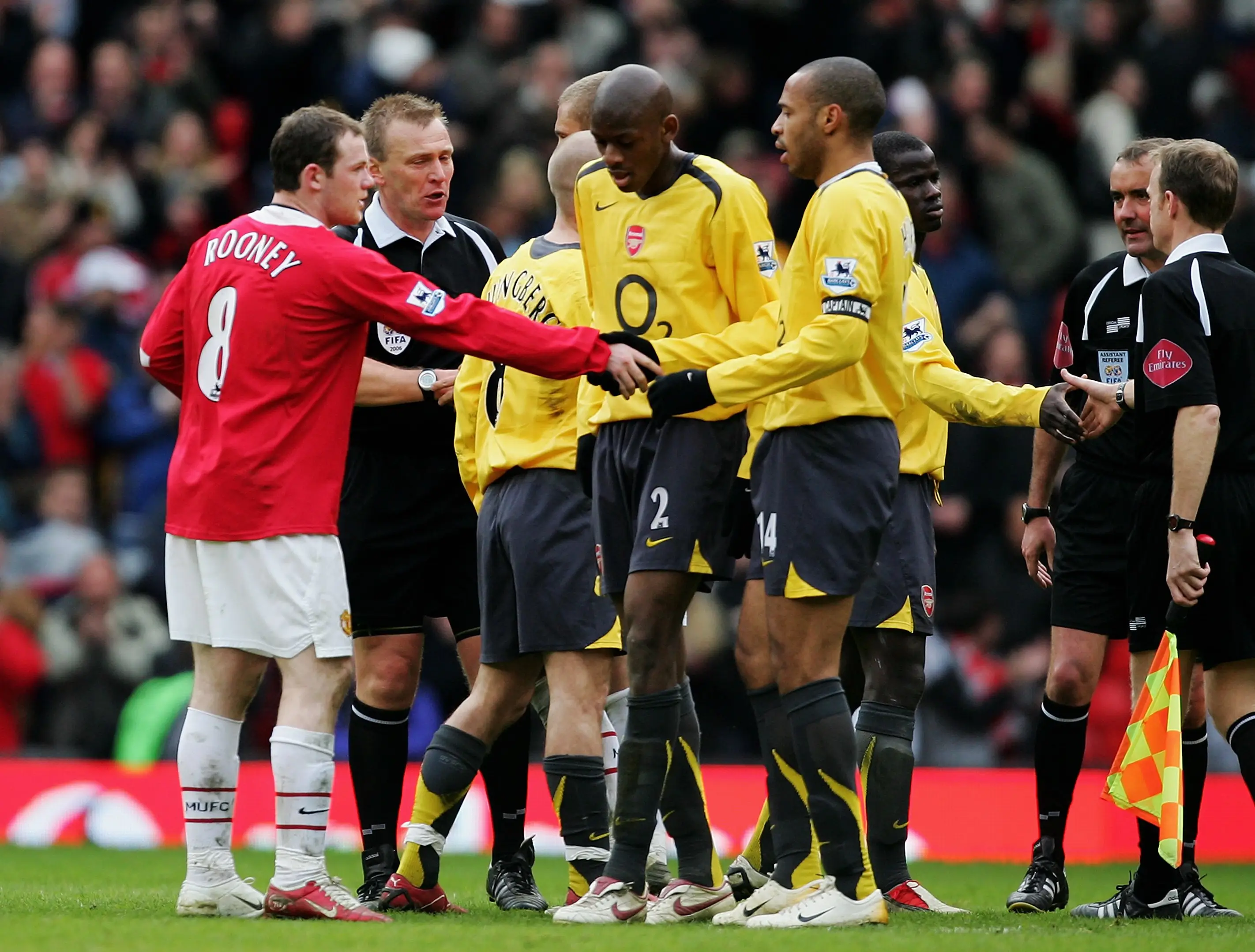 Wayne Rooney shakes Thierry Henry's hand in 2006. Image credit: Getty