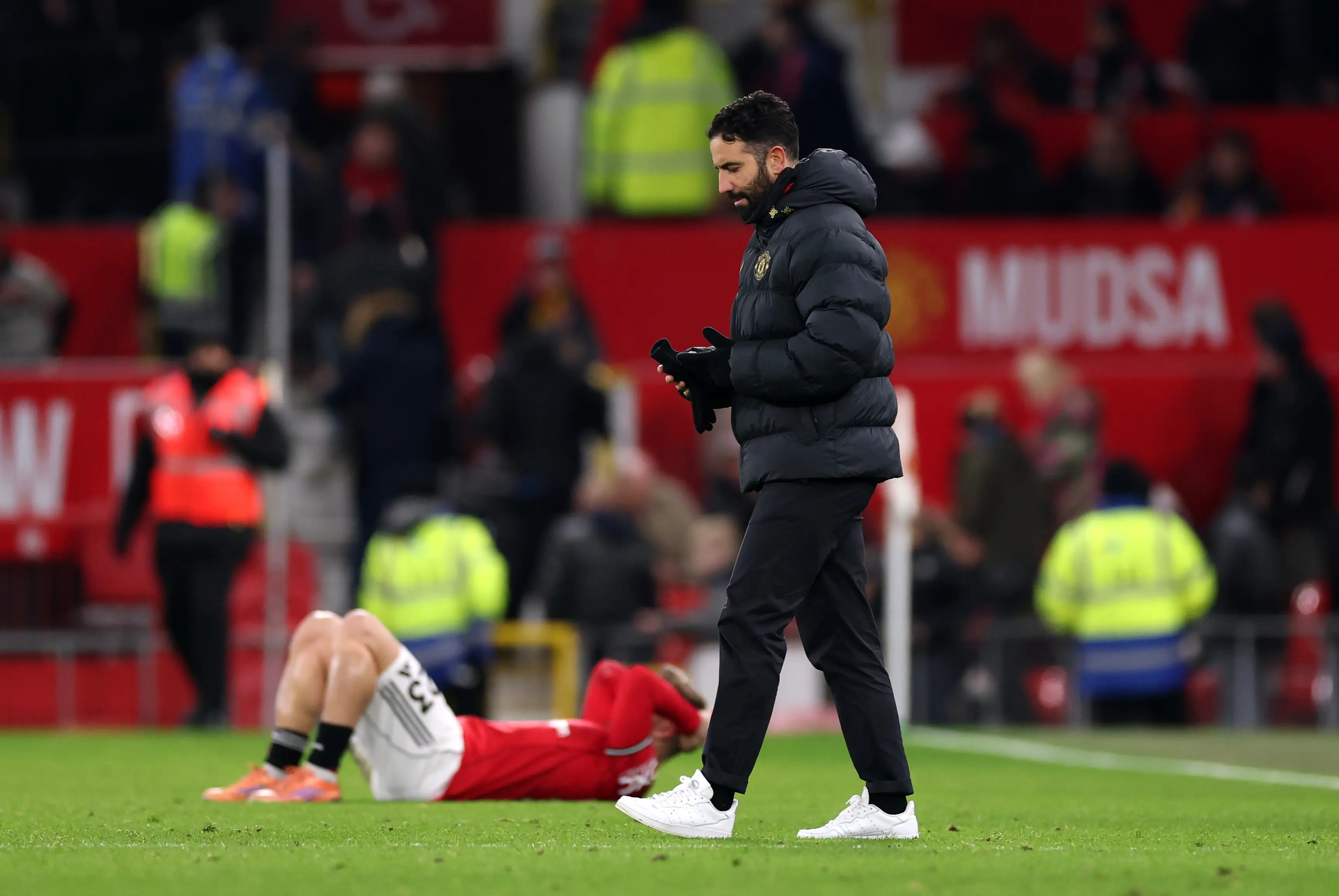 Ruben Amorim cuts a frustrated figure after Manchester United's 1-1 draw against Wolves. Image: Getty 