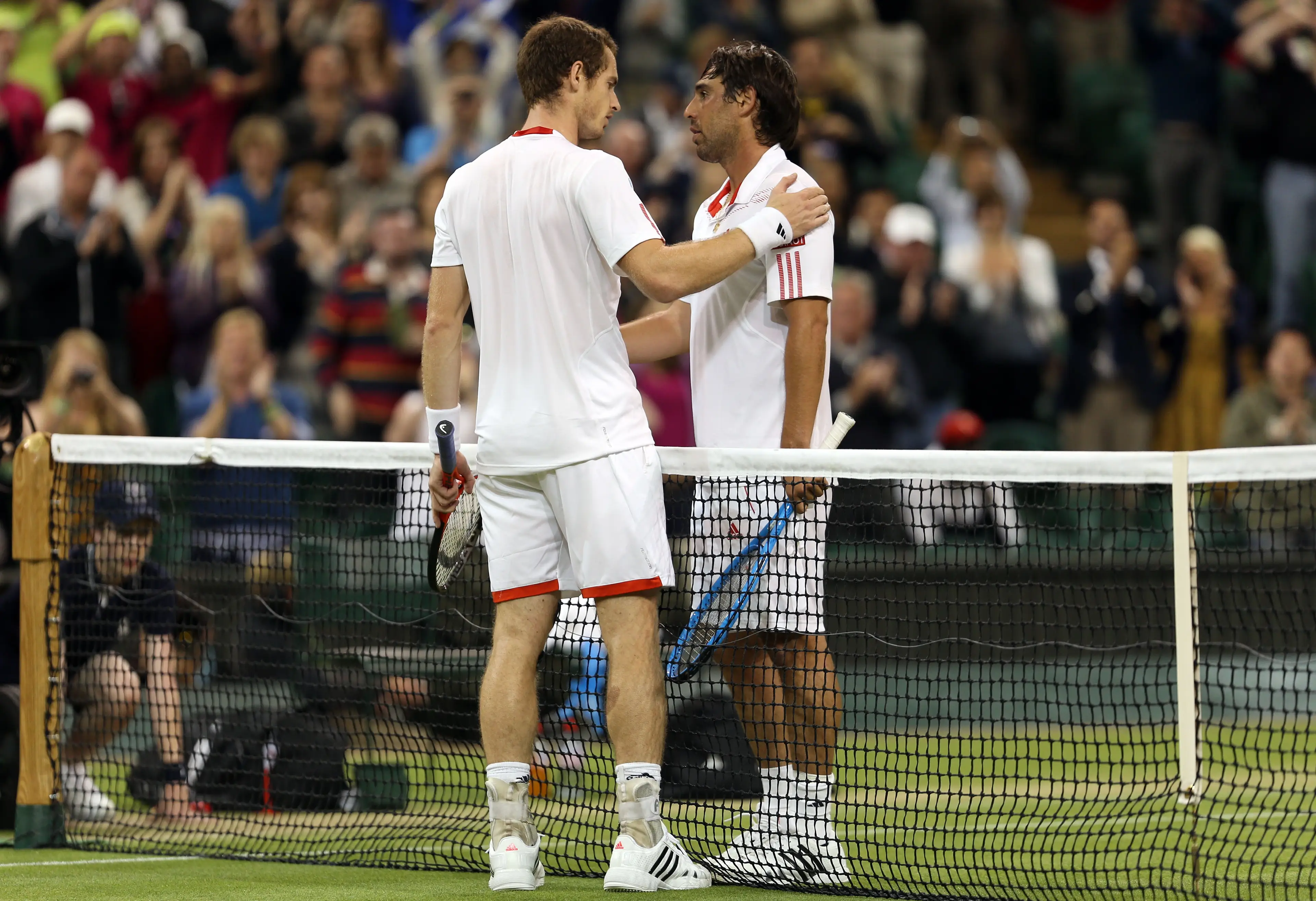 Murray and Baghdatis after their third round match at Wimbledon in 2012. Image credit: Getty