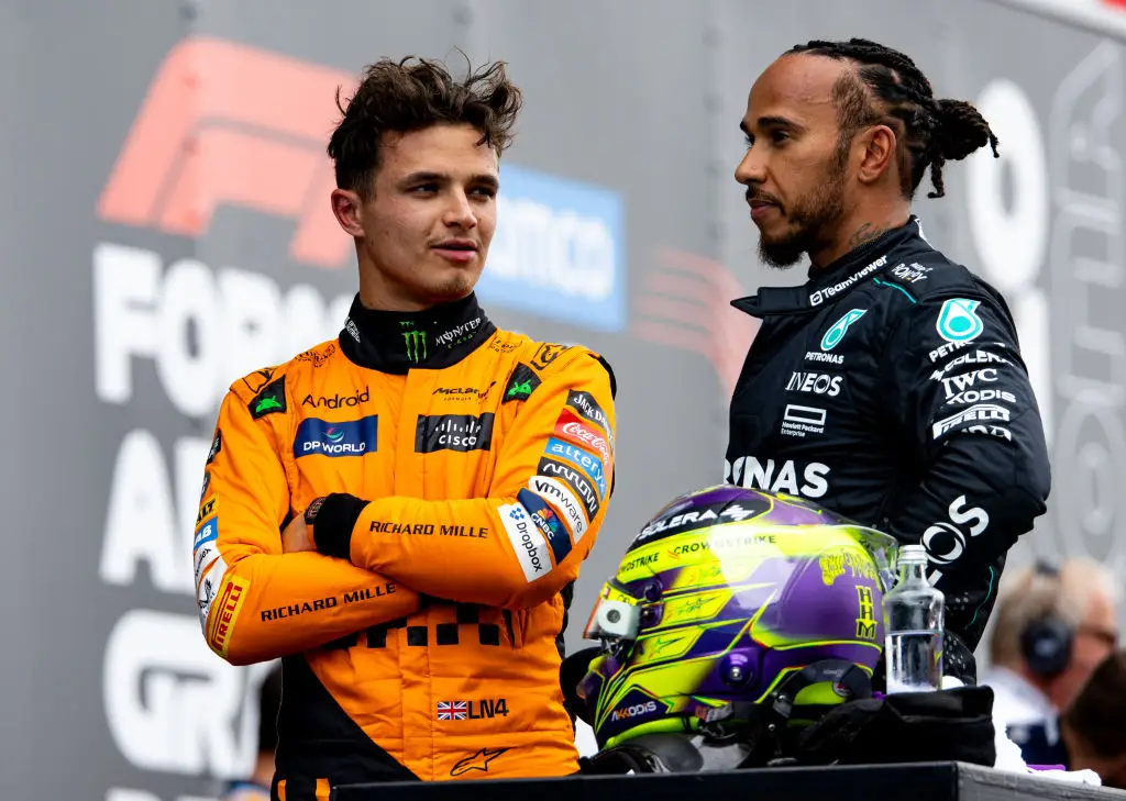 Lando Norris and Lewis Hamilton pictured in conversation - Getty