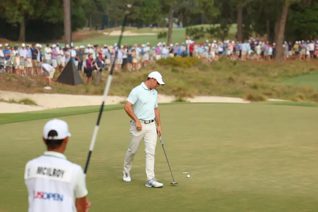 Rory McIlroy disappointed as he bogey'd hole 18, to drop to second place with a score of -5 (Image: Getty)