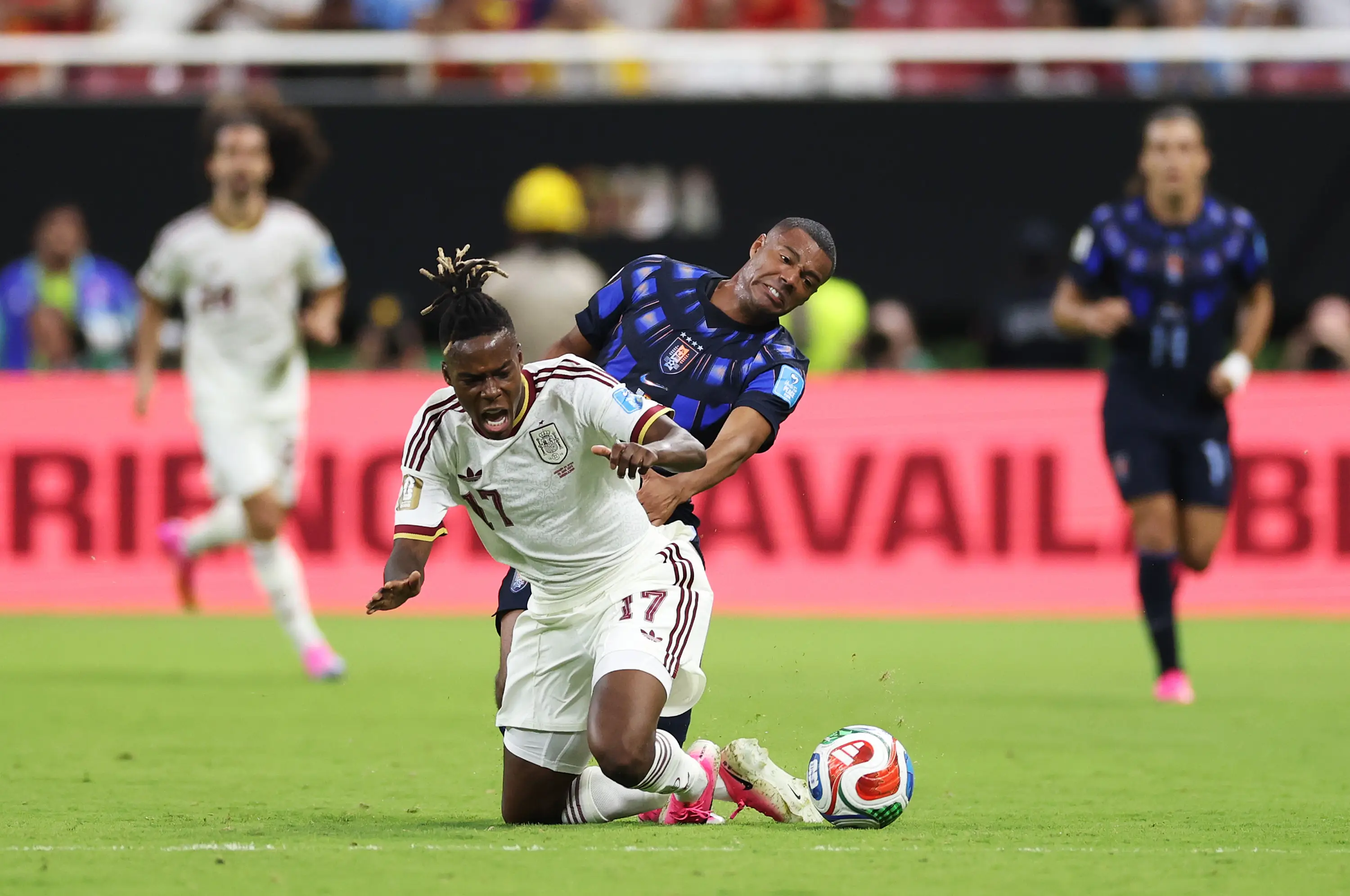 Nico Williams #17 of Spain is fouled by Nicolas de la Cruz #7 of Uruguay resulting in a yellow card during the FIFA World Cup (Getty Images)