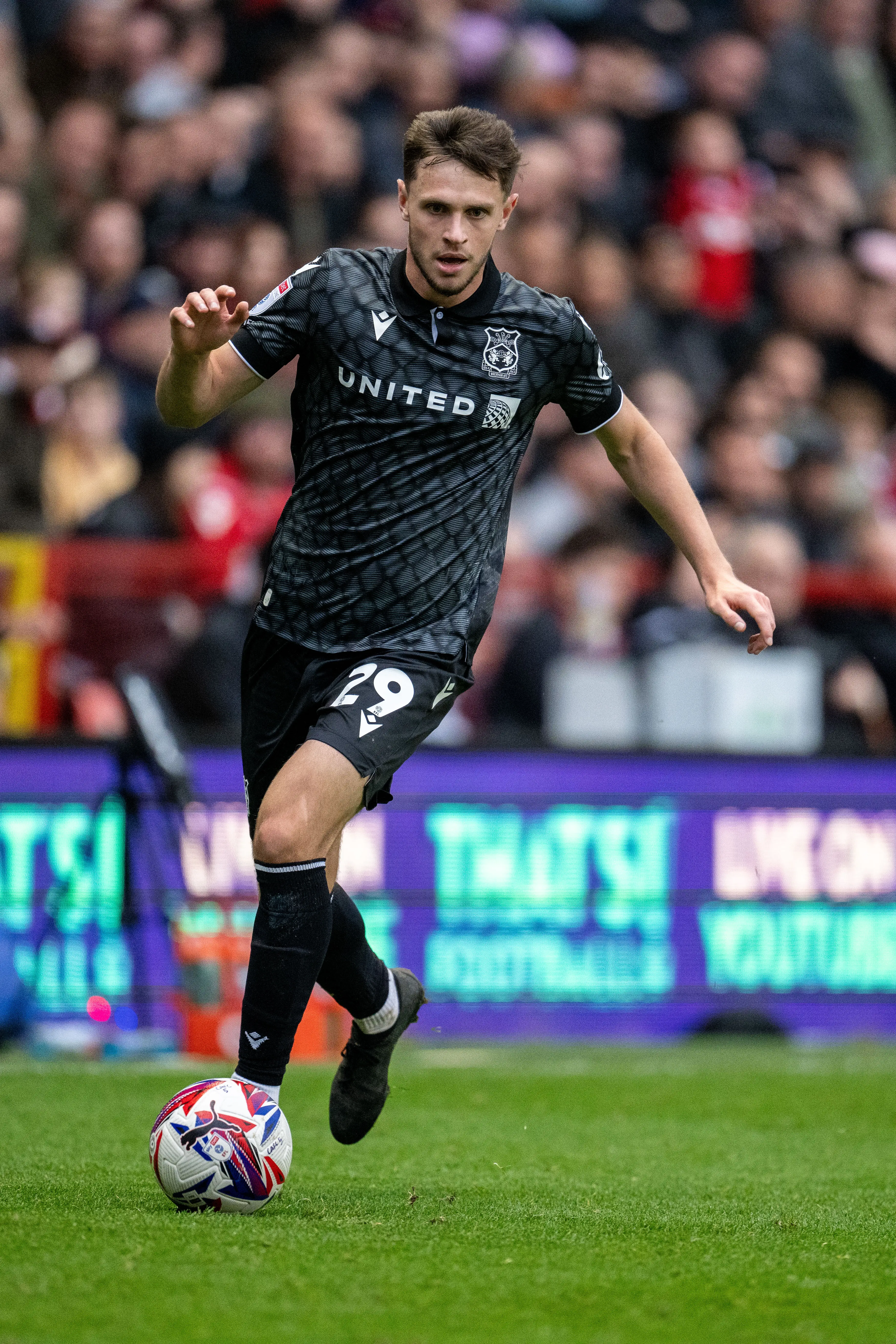 Wrexham's Ryan Barnett is a man in demand. Image: Getty