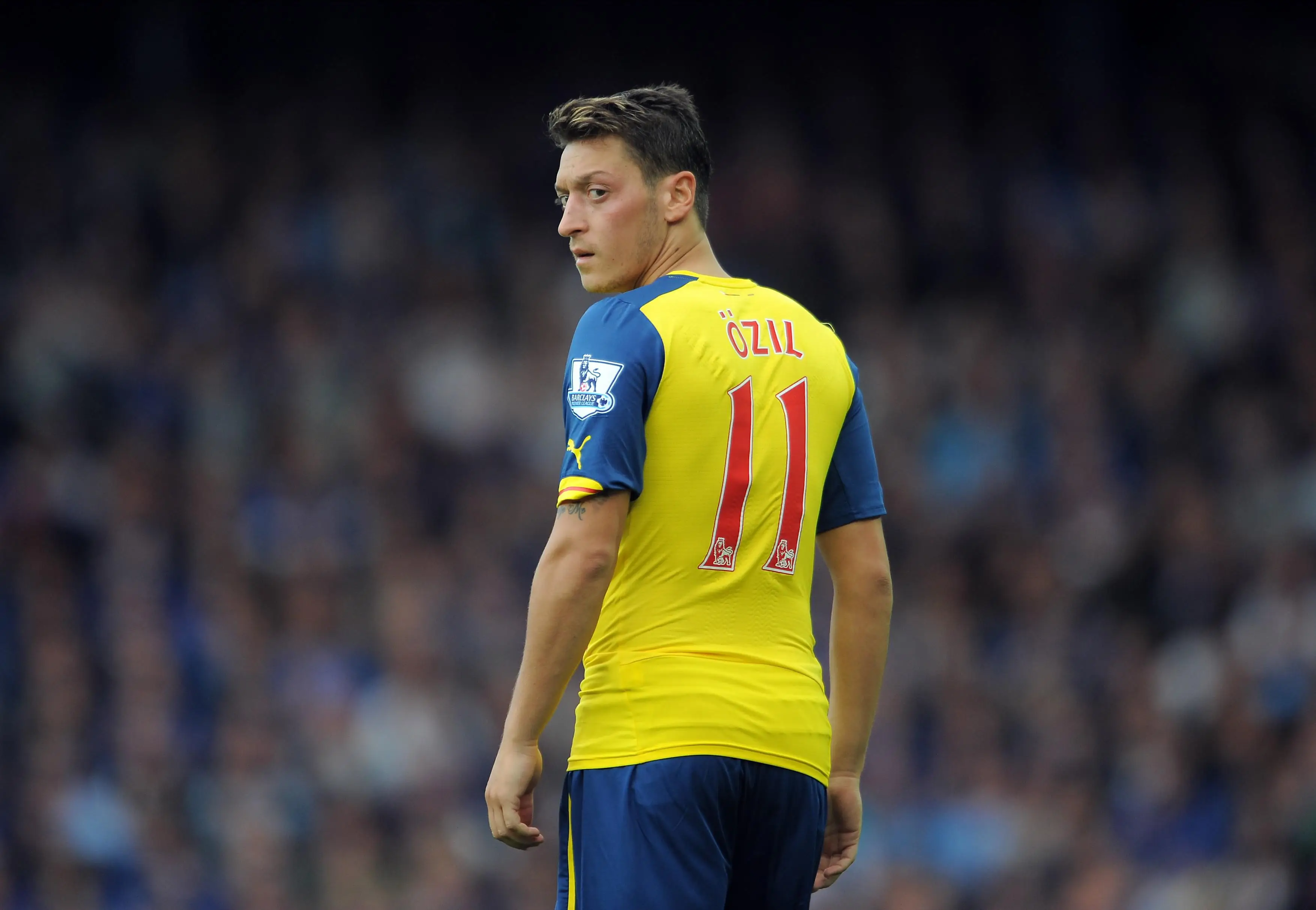 Mesut Ozil for Arsenal in 2014,