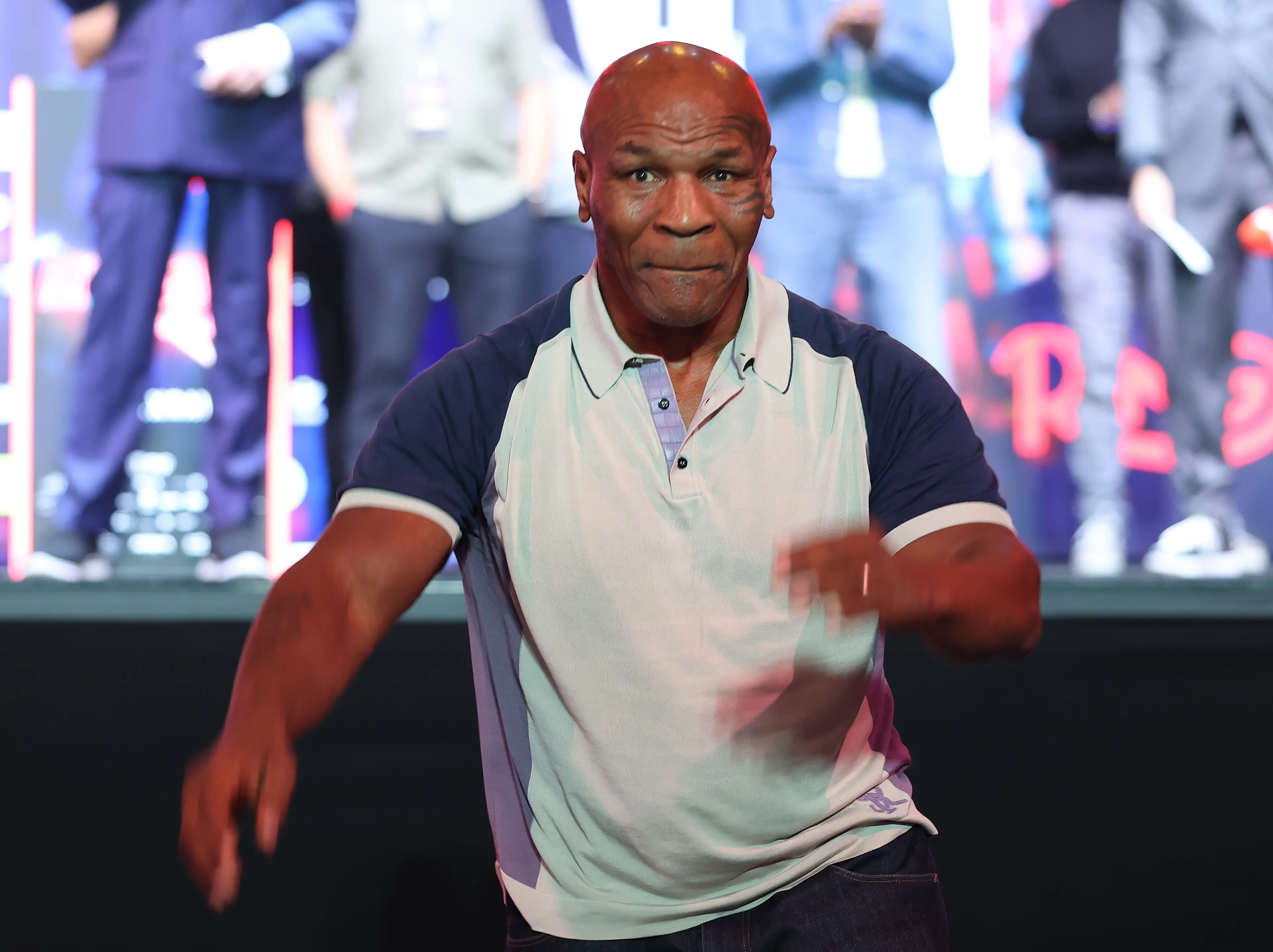 Mike Tyson punched MrBeast at the fight between Canelo Alvarez and Terence Crawford. (Image: Getty)