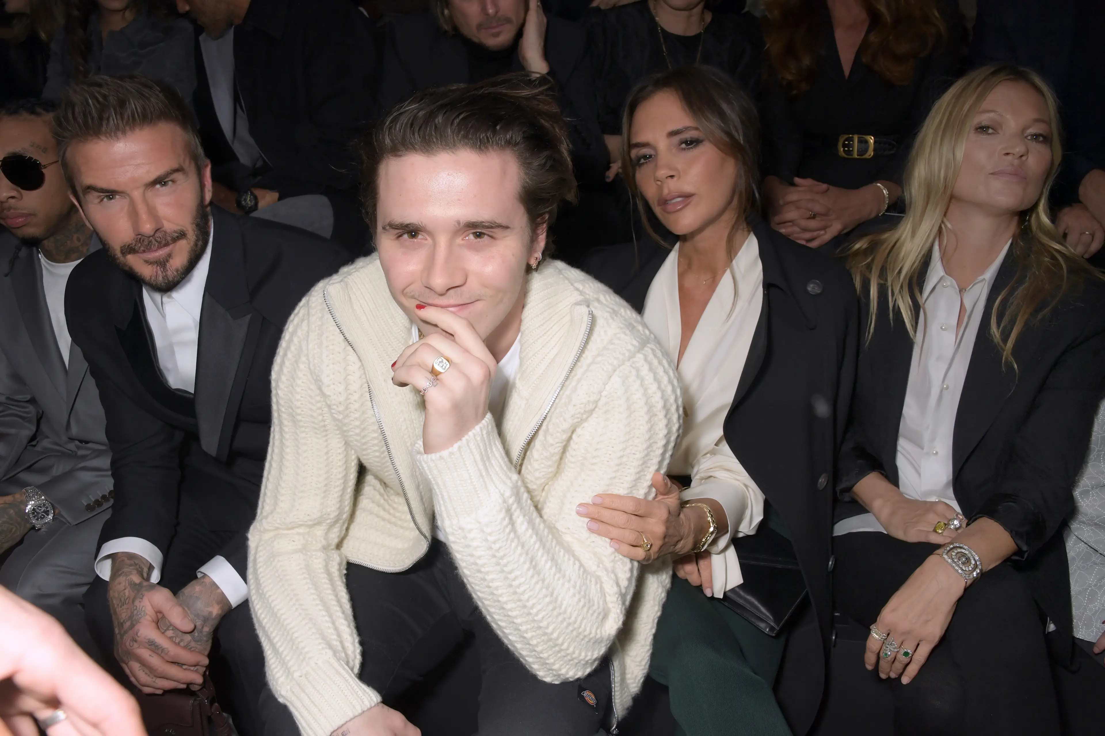 Brooklyn Beckham with his parents, David and Victoria. Image credit: Getty