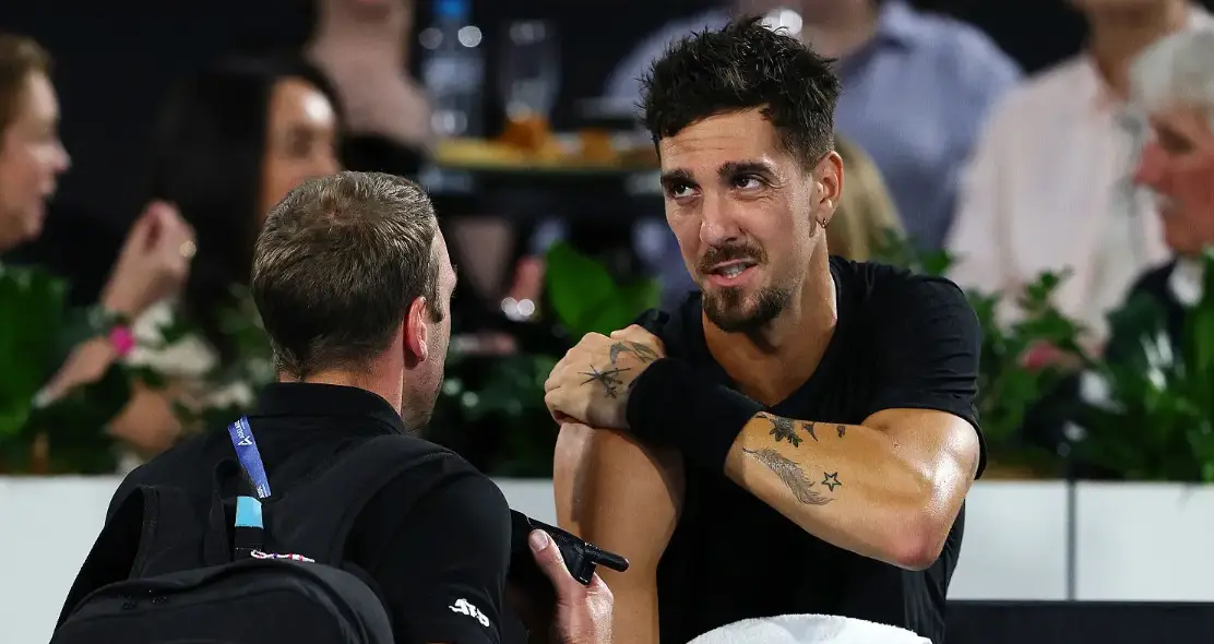 Thanasi Kokkinakis injured his shoulder during day one of the 2026 Adelaide International. (Image: Sarah Reed/Getty Images)