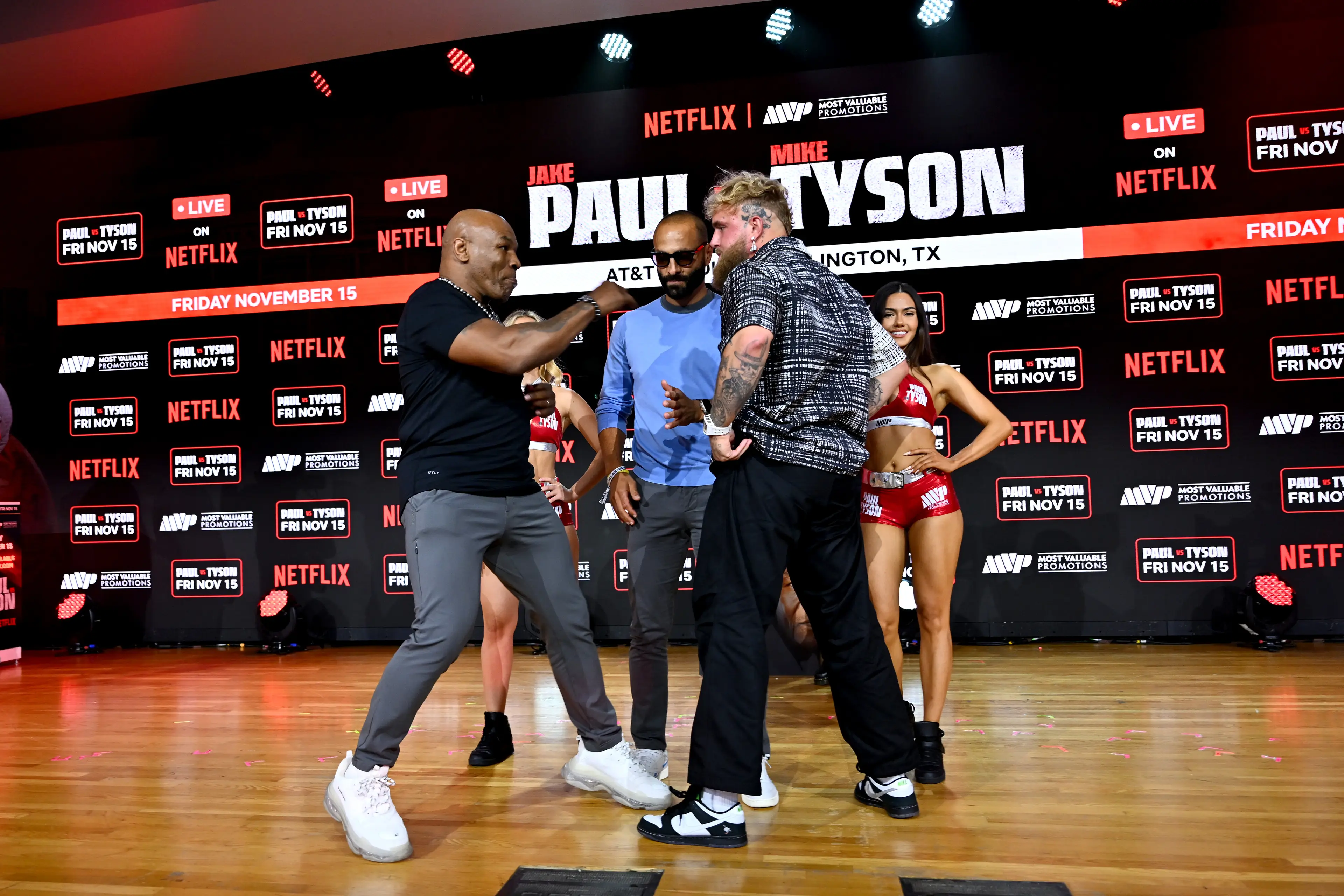 Mike Tyson and Jake Paul face off ahead of their fight. Image: Getty