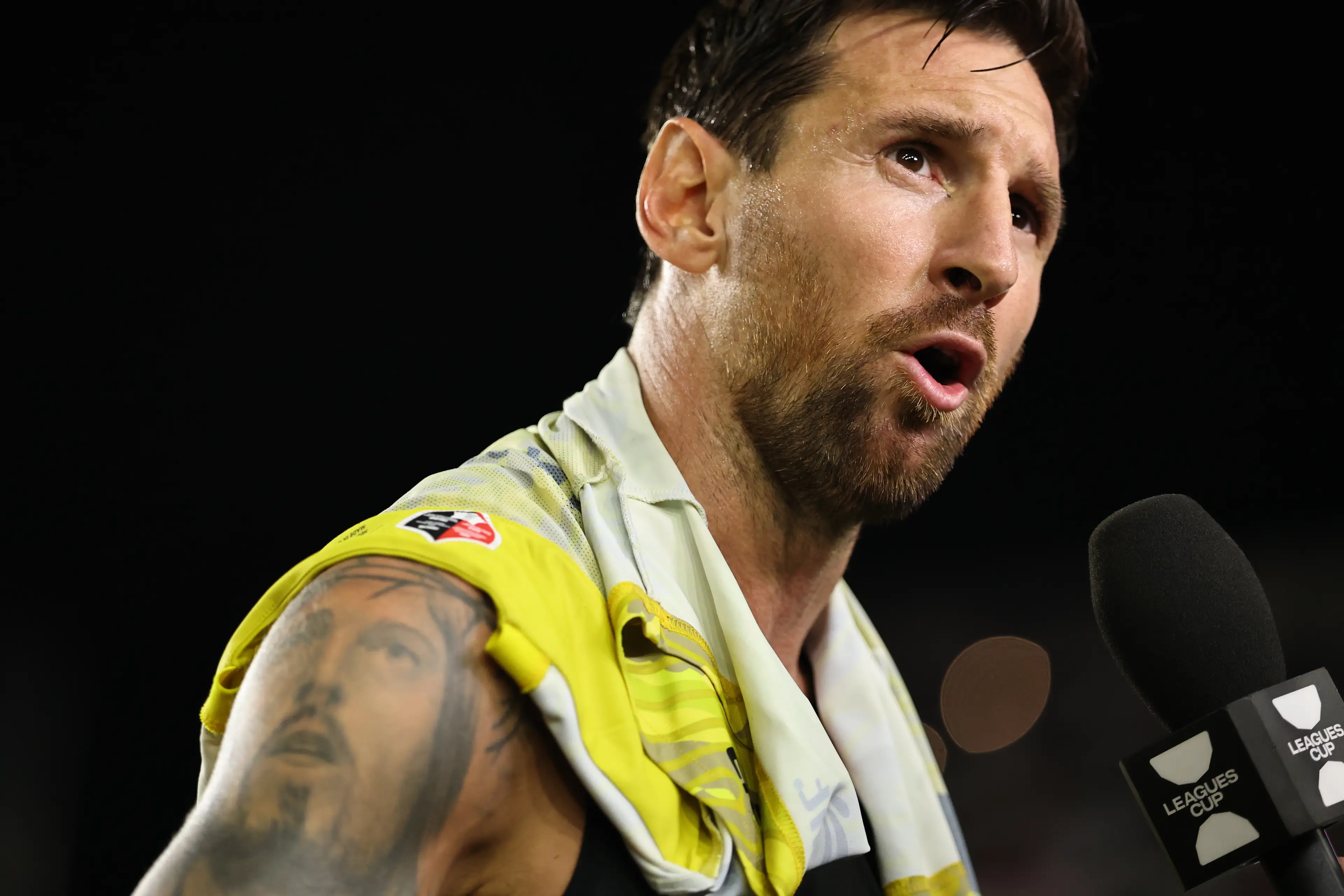Lionel Messi speaks to a reporter after Inter Miami's Leagues Cup fixture. Image: Getty 