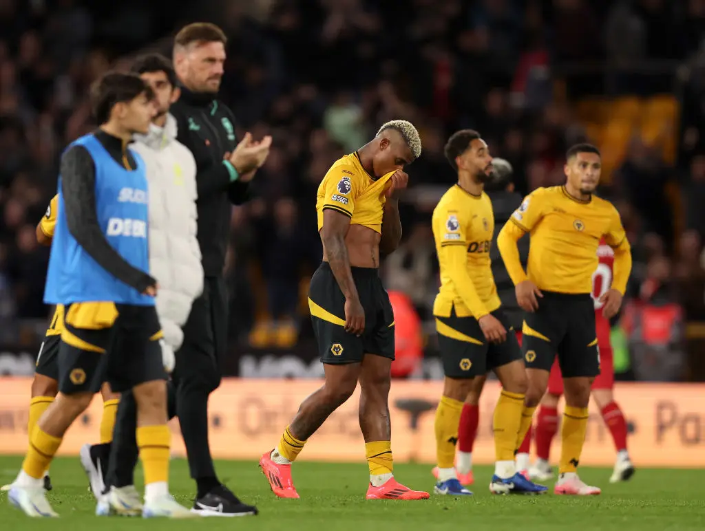 Wolves players acknowledge the fans after their 2-1 defeat to Liverpool -