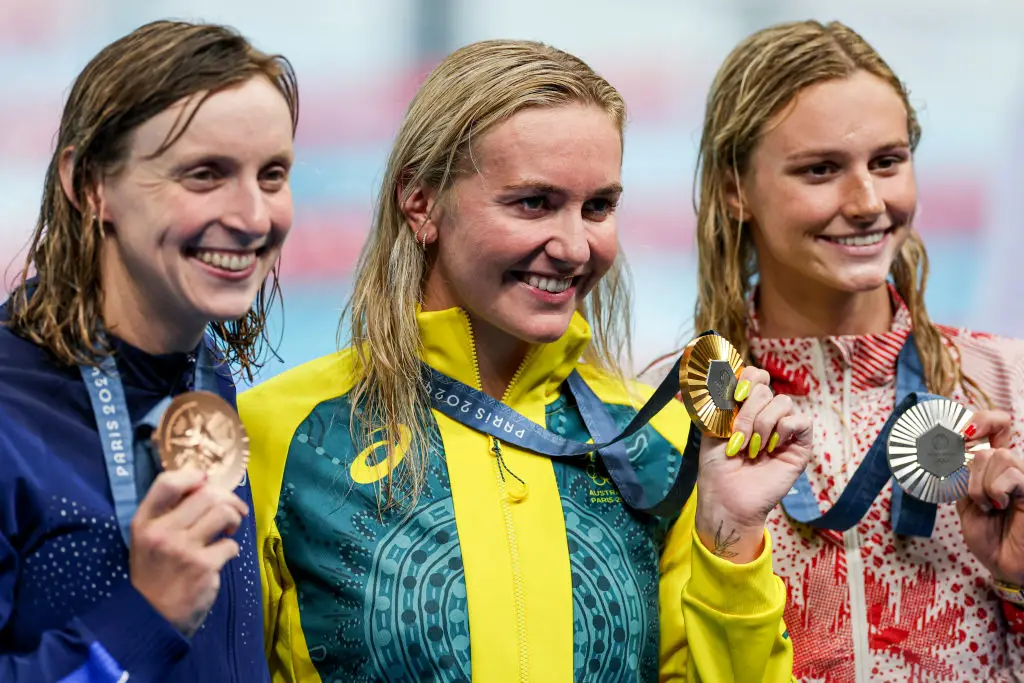 Australia's Ariarne Titmus won gold ahead of Summer McIntosh (right) and Katie Ledecky (left) in the women's 400m freestyle -
