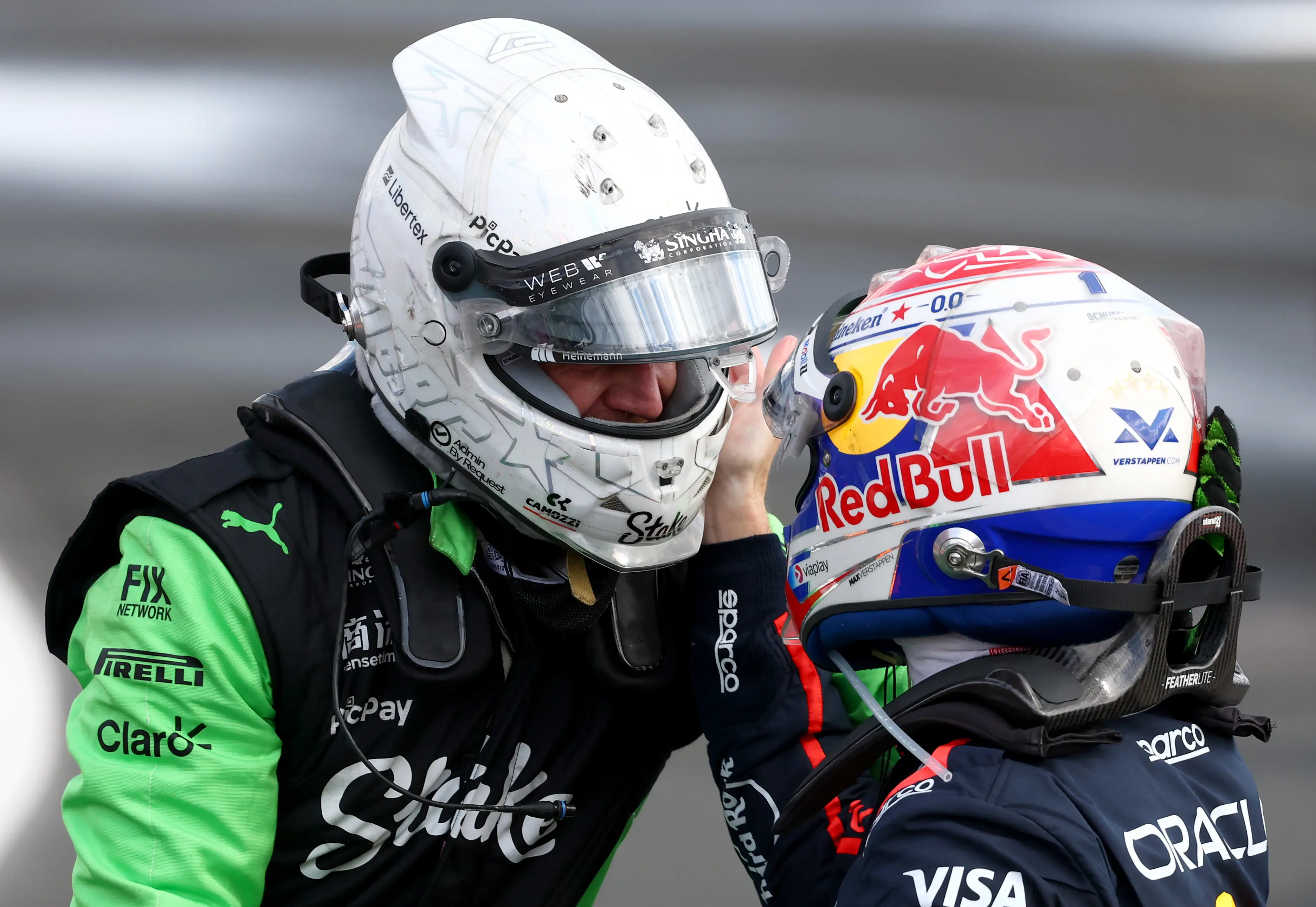 Nico Hulkenberg is congratulated by Max Verstappen after finishing third at the British Grand Prix. (Image: Getty)