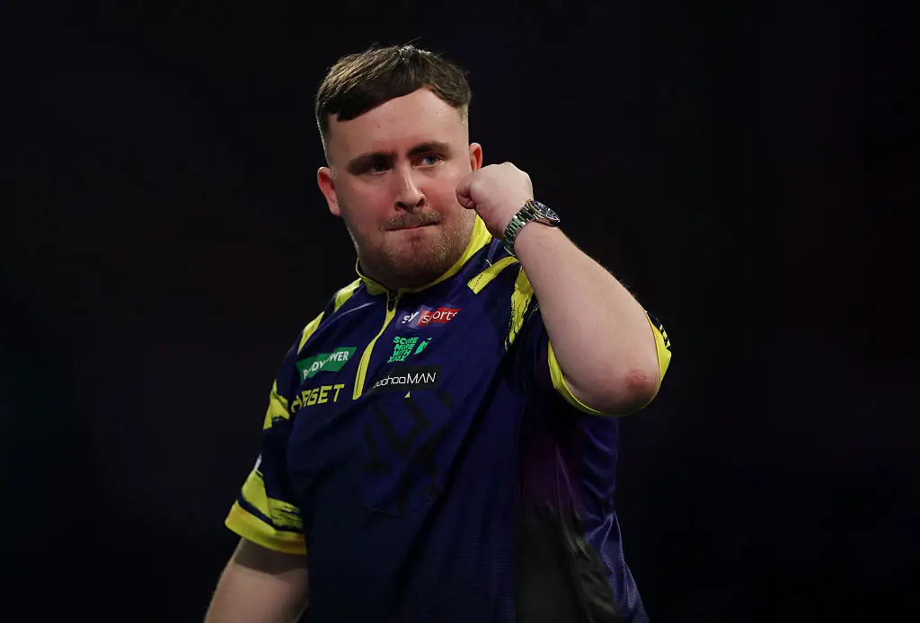 Luke Littler will compete in the PDC World Darts Championship final. (Image: Warren Little/Getty Images)