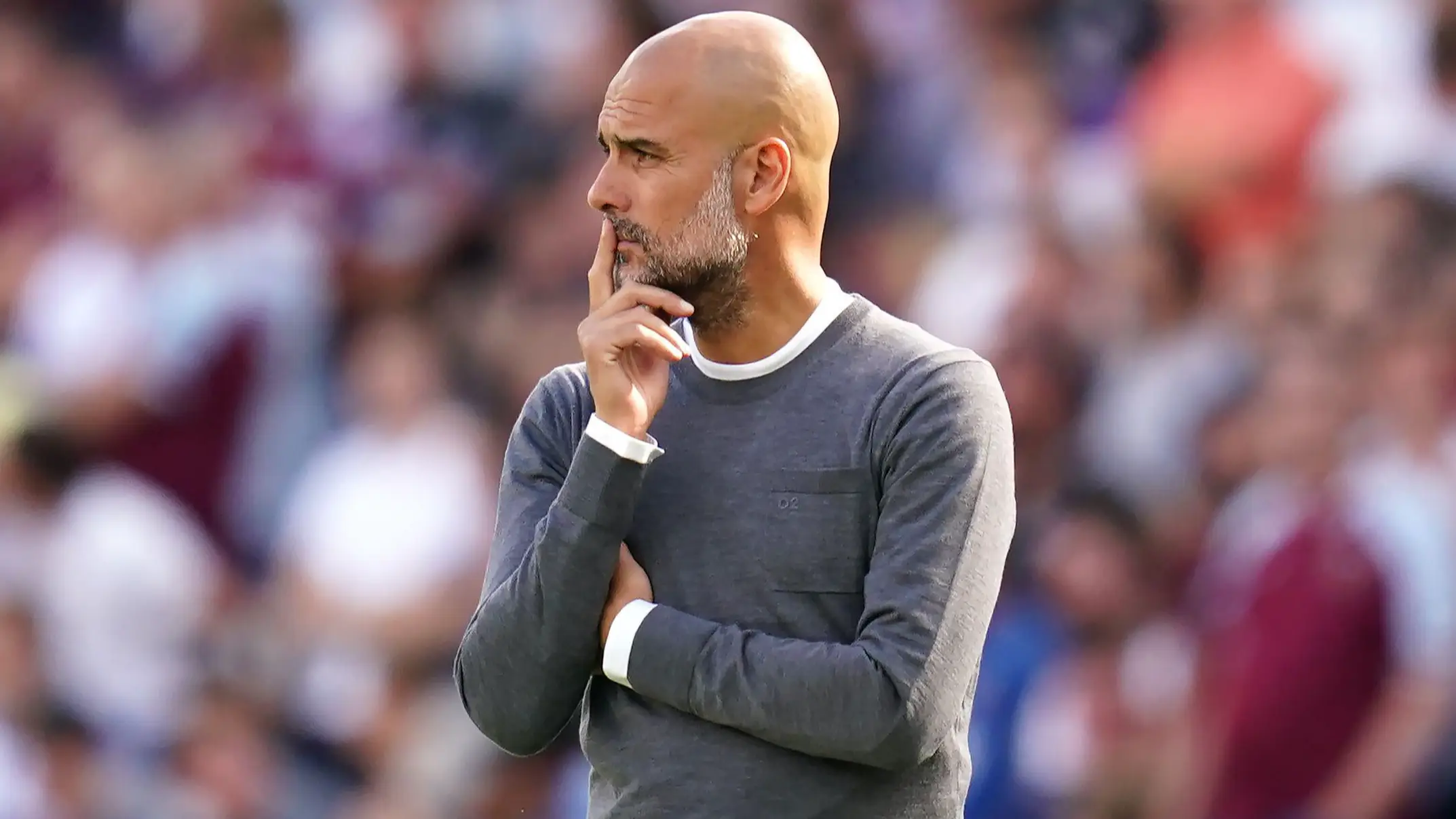 Pep Guardiola looks on in Manchester City's 0-2 win against West Ham.