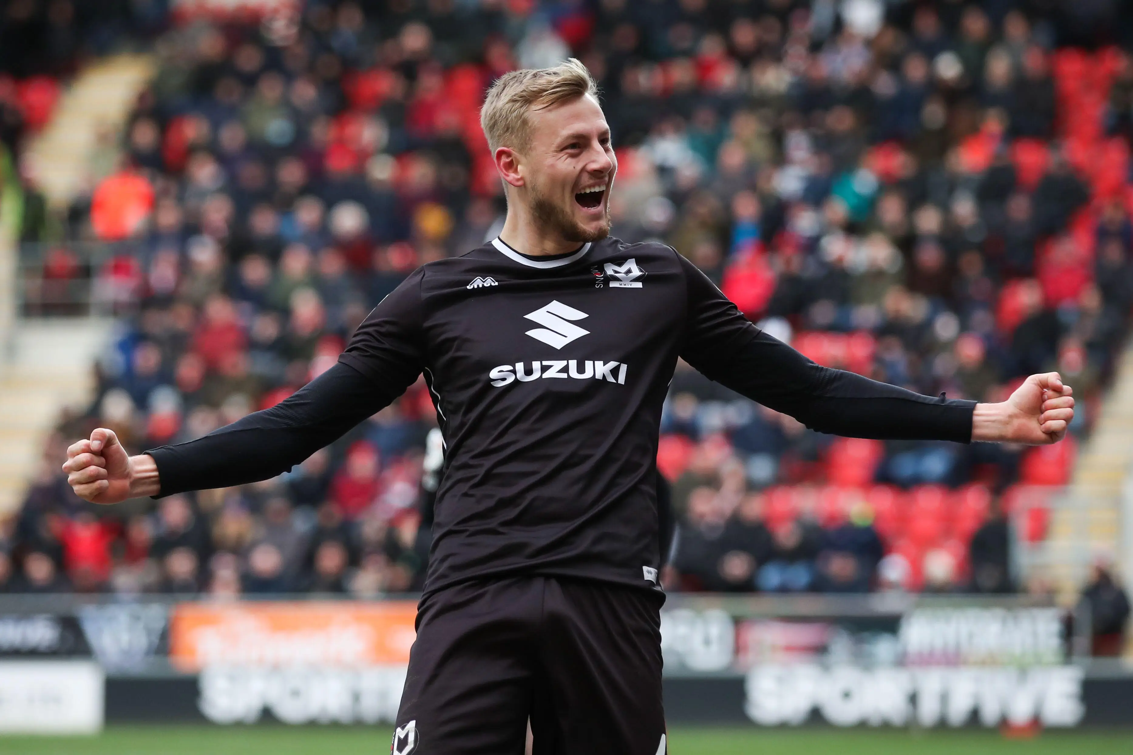 Milton Keynes Dons' Harry Darling celebrates scoring their side's first goal of the game during the Sky Bet League One match against Rotherham. (Alamy)