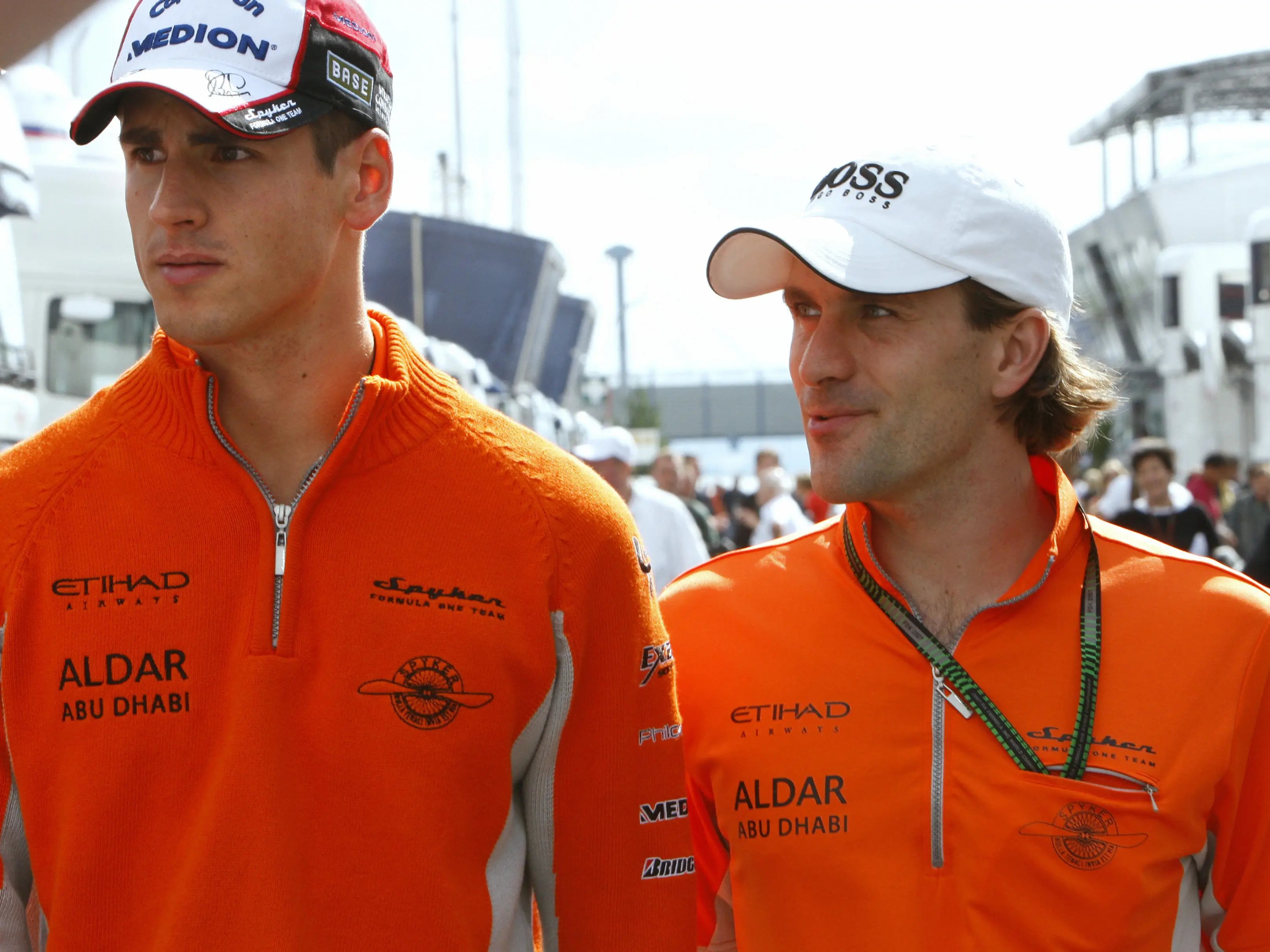 German Spyker MF1 driver Adrian Sutil (L) and team mate German Markus Winkelhock walk in the paddock of the Nuerburgring (Getty Images)