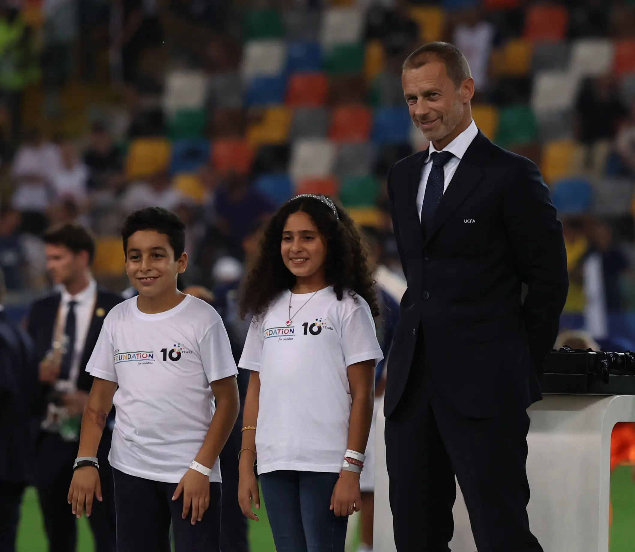 Ceferin handed out medals alongside two Palestinian children at the UEFA Super Cup last month. Image: Getty