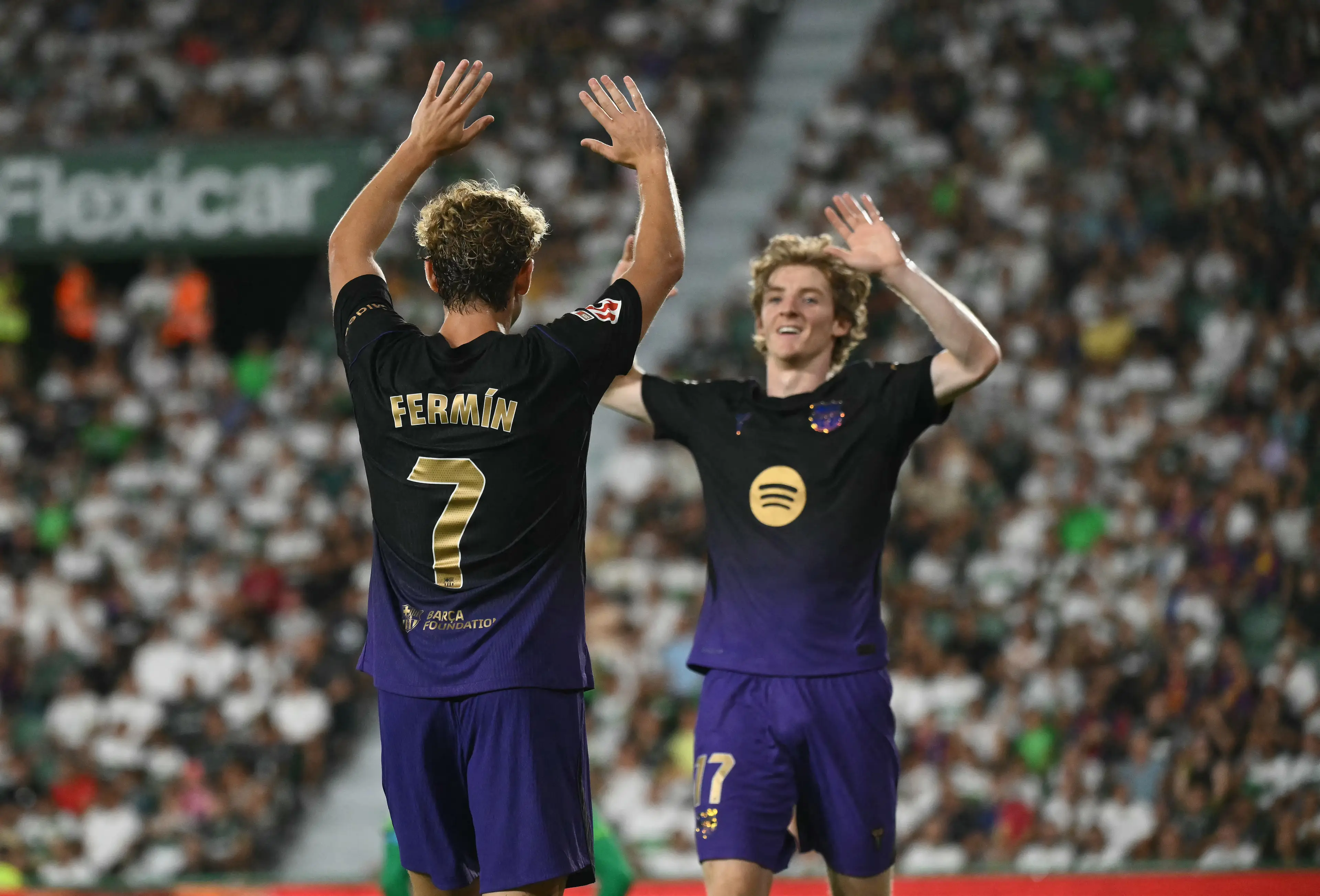 Anthony Gordon celebrates with Fermin Lopez. Image credit: Getty
