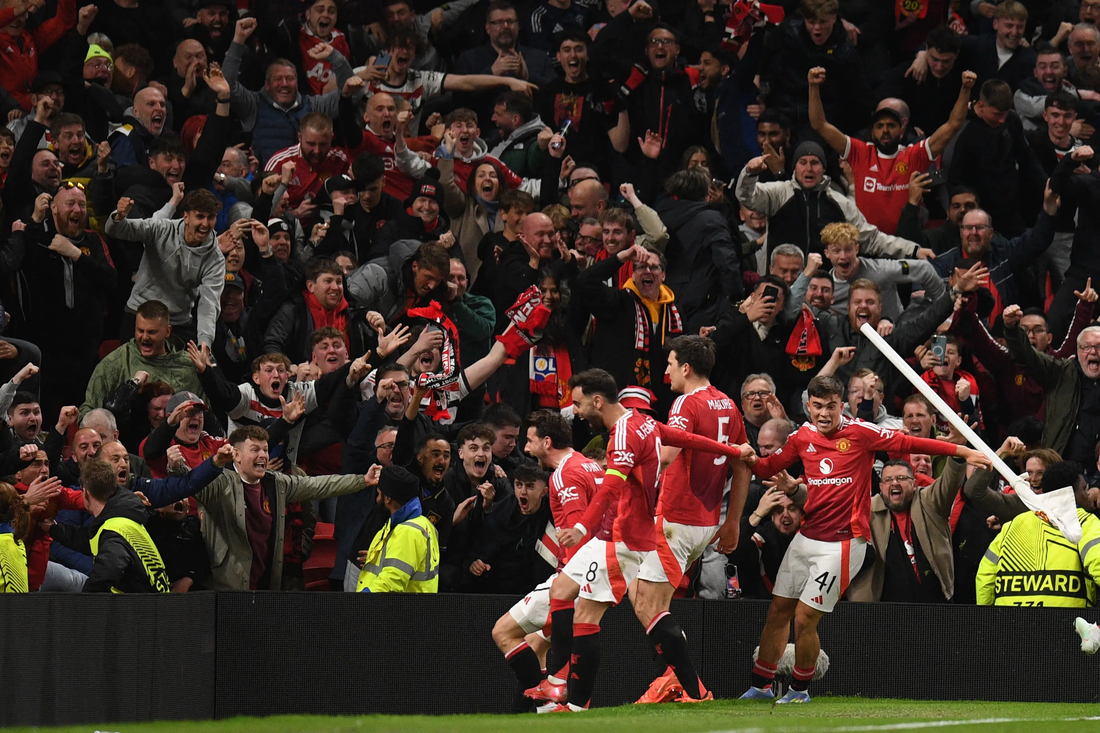 Old Trafford erupts after Harry Maguire's winner for Manchester United. Image: Getty