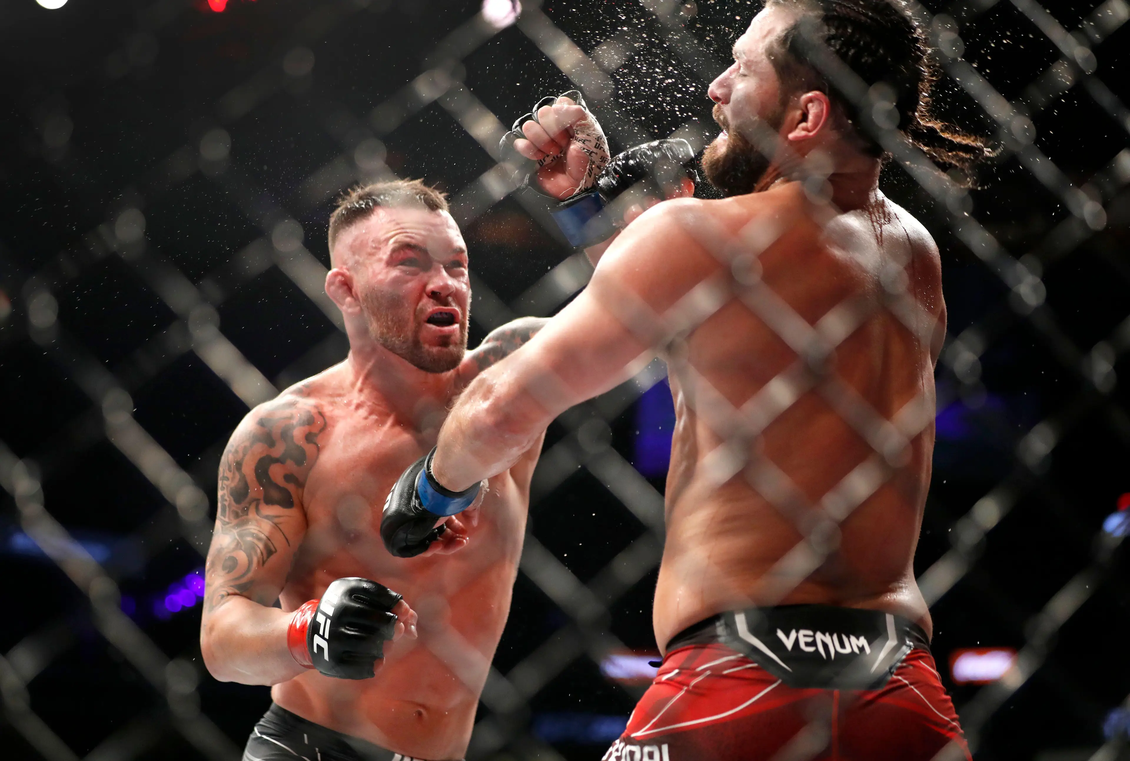 Colby Covington and Jorge Masvidal during their fight at UFC 272. Image: Alamy