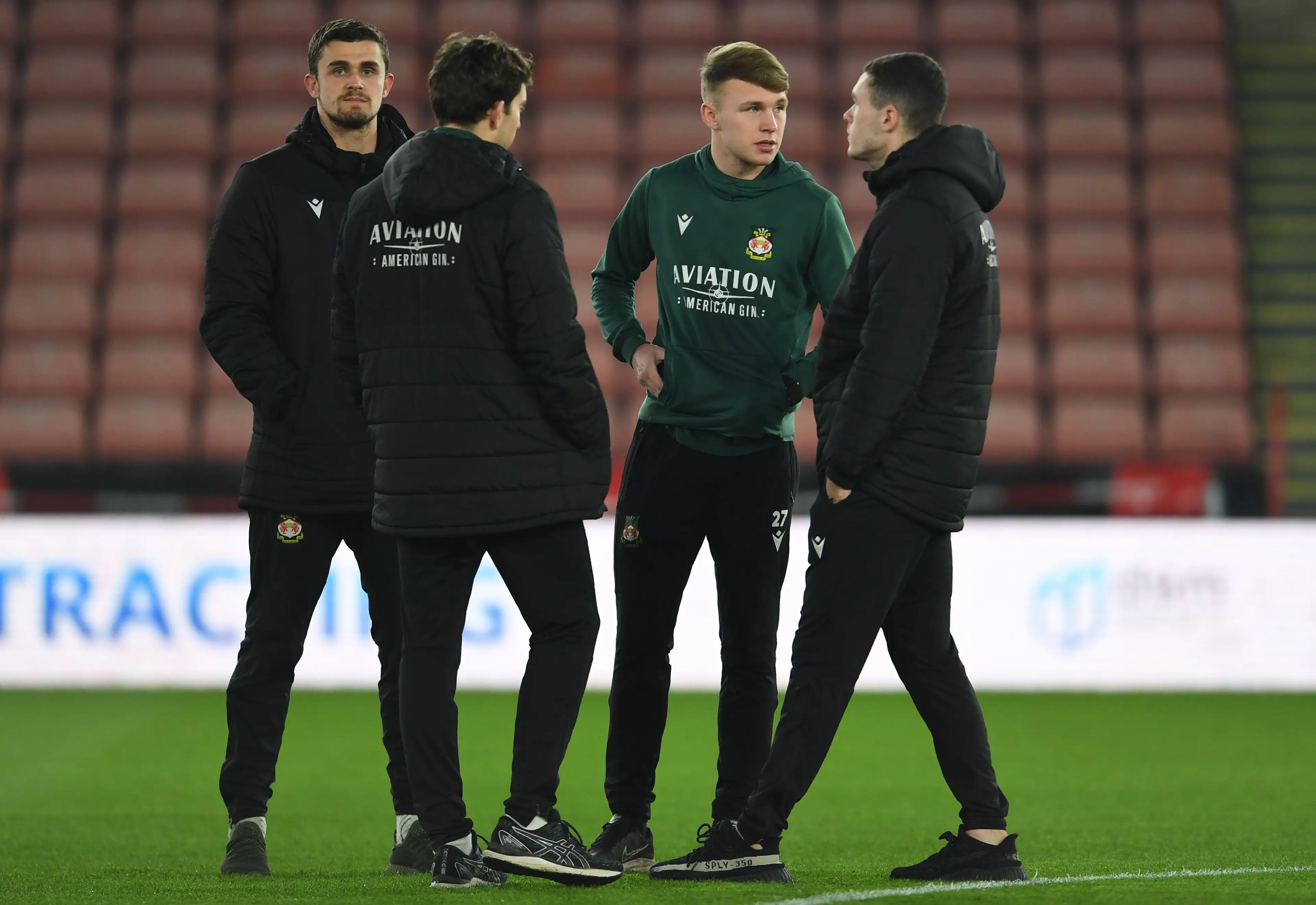  Jake Bickerstaff (C) and Kai Calderbank-Park (L) of Wrexham before the FA Cup match against Sheffield United. Image credit: Alamy