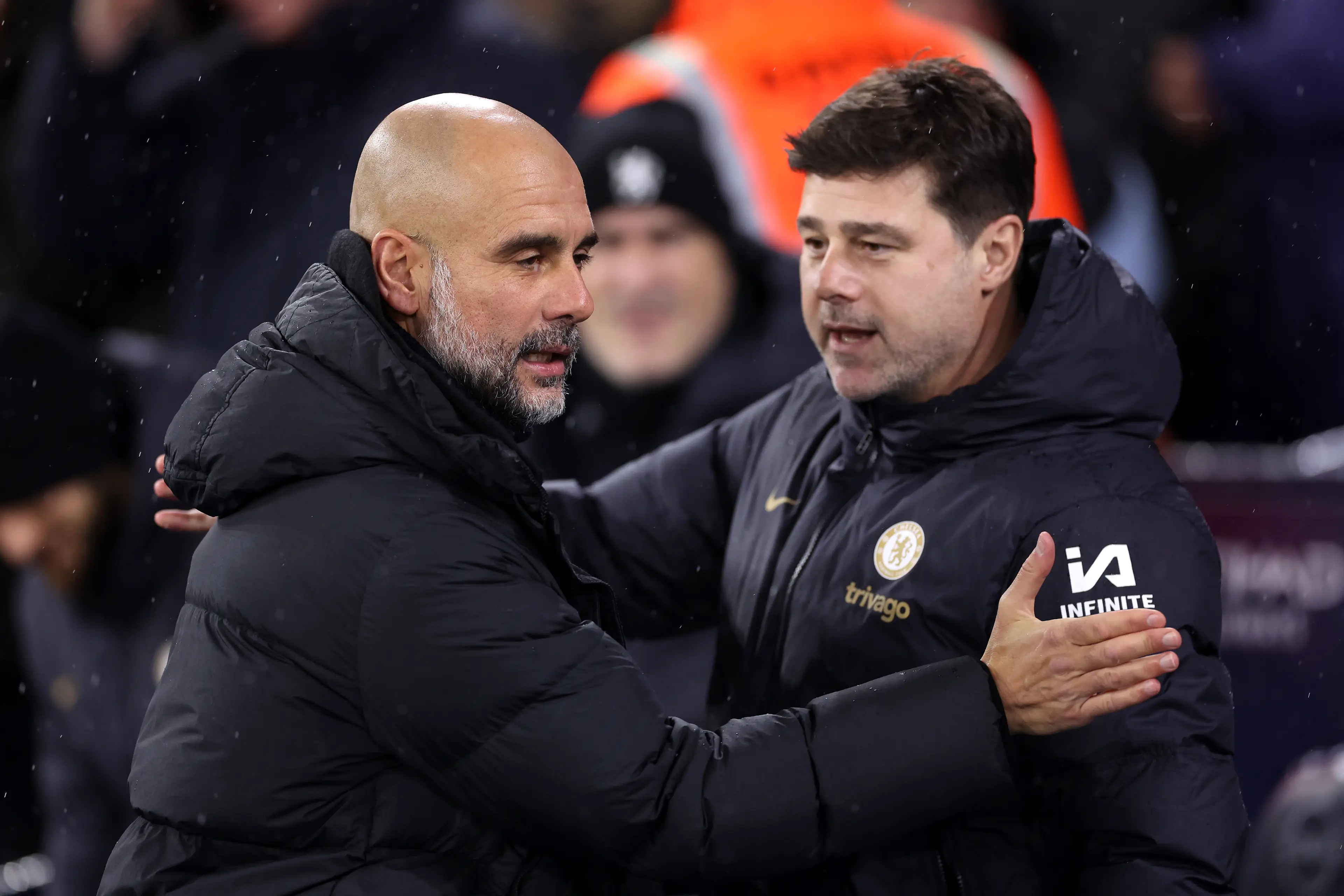 Pep Guardiola and Mauricio Pochettino during Manchester City vs. Chelsea. Image: Getty