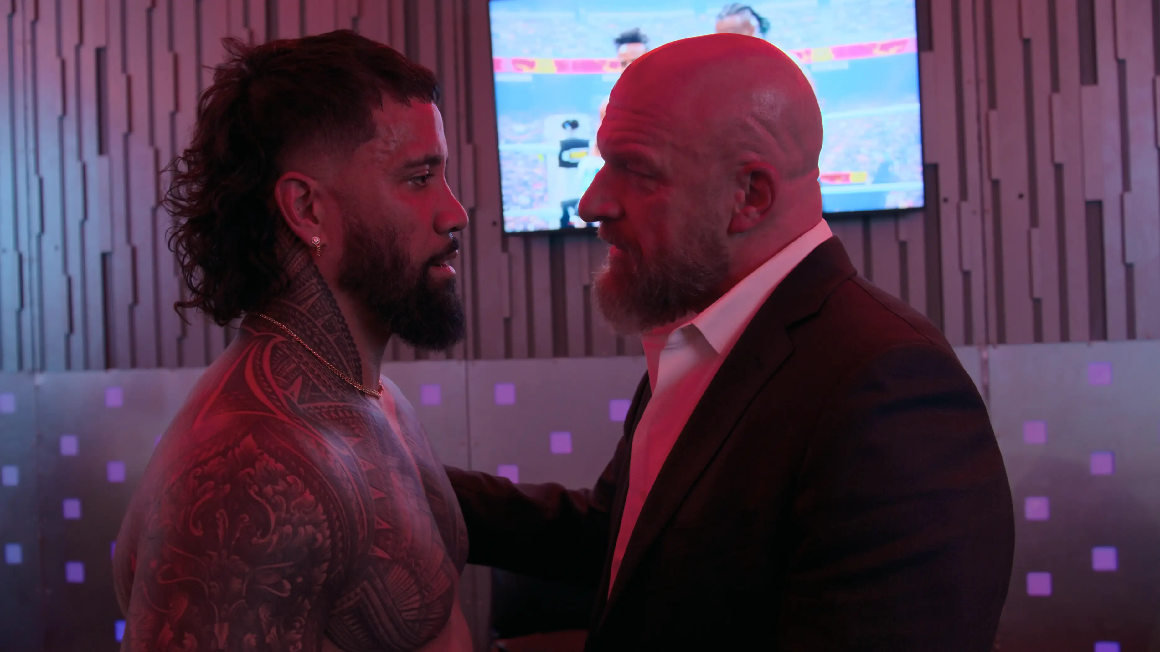 Triple H speaks with Jey Uso backstage in WWE Unreal. Image: Netflix