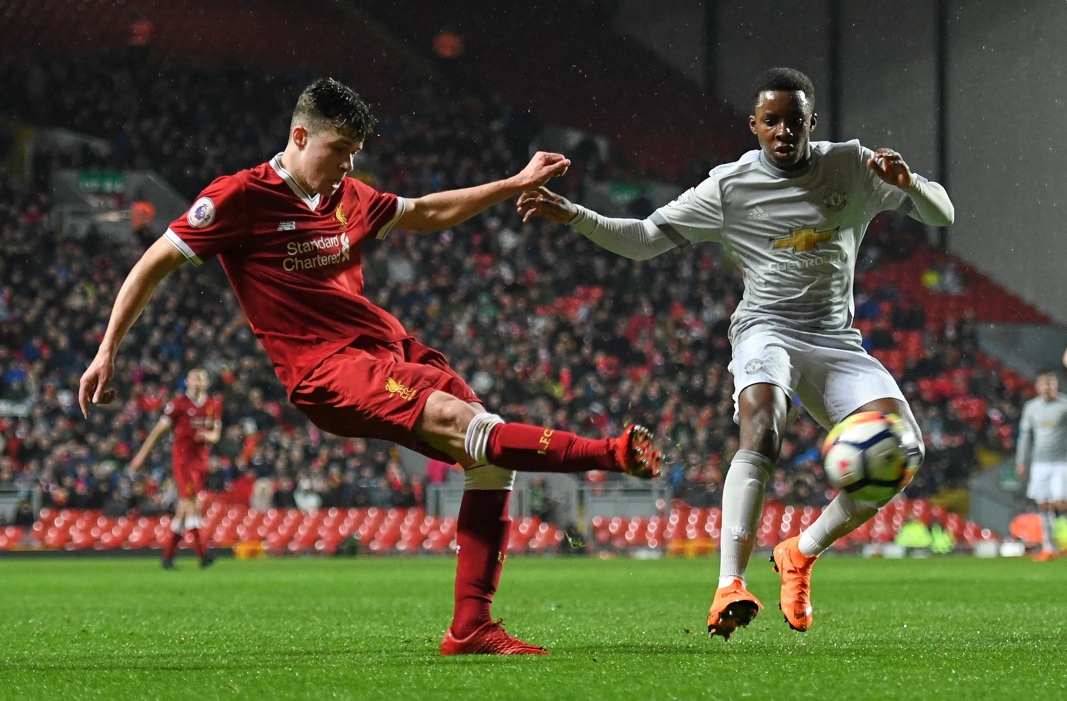 Tosin Kehinde comes up against Liverpool in 2018. Image credit: Getty