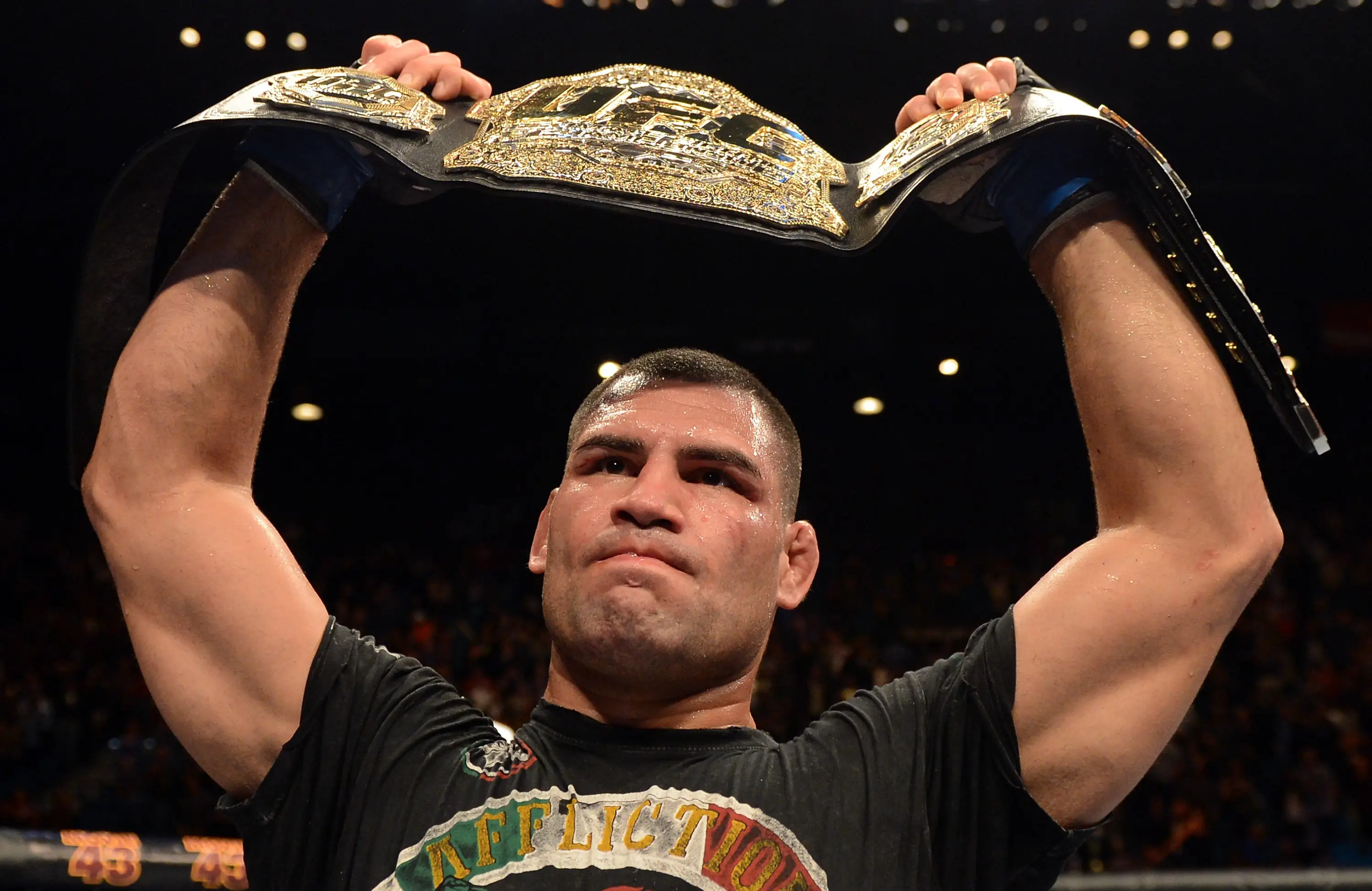Cain Velasquez with the UFC title- Getty