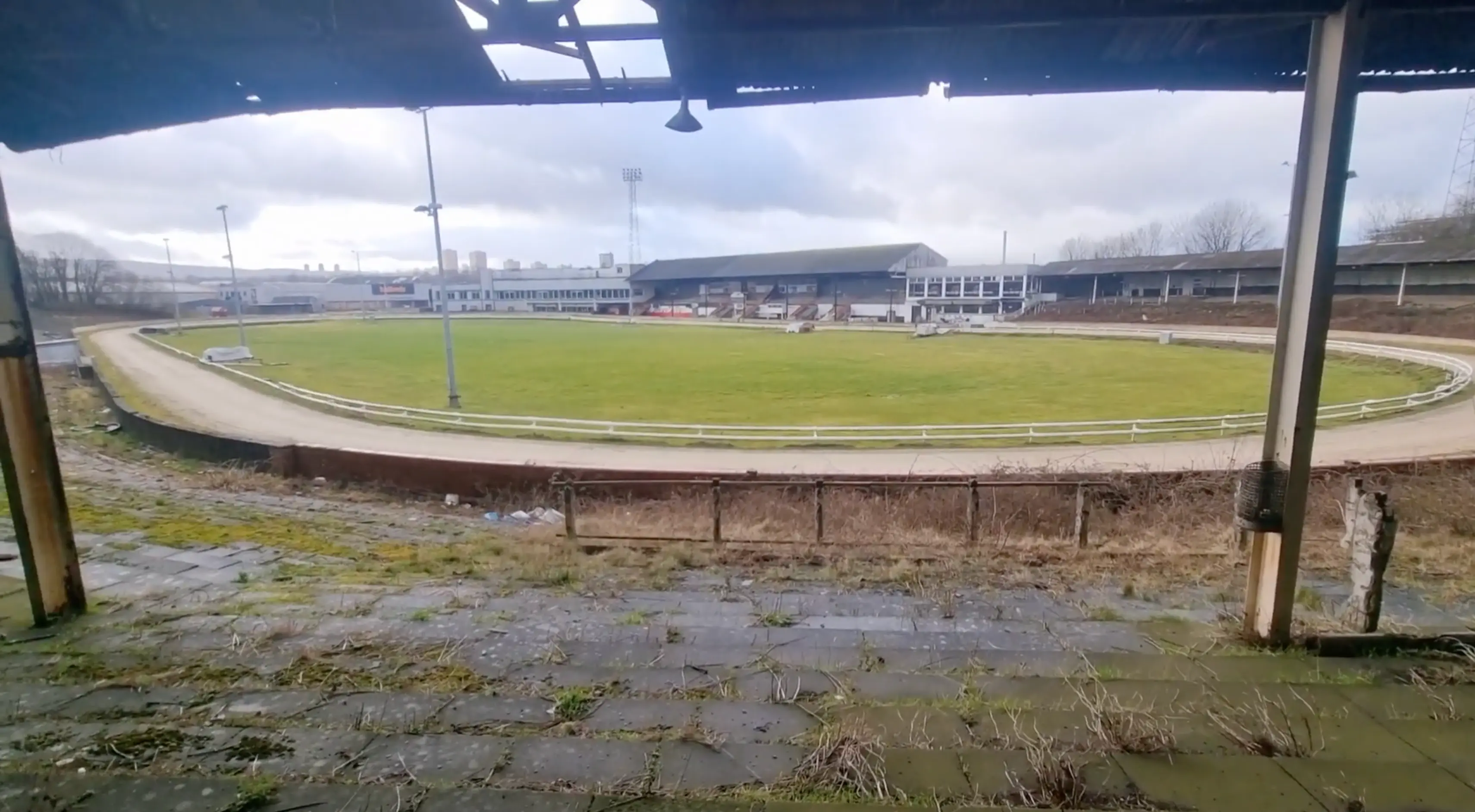 Debris and overgrown grass can be seen across the Shawfield stadium. (Image: Getty)