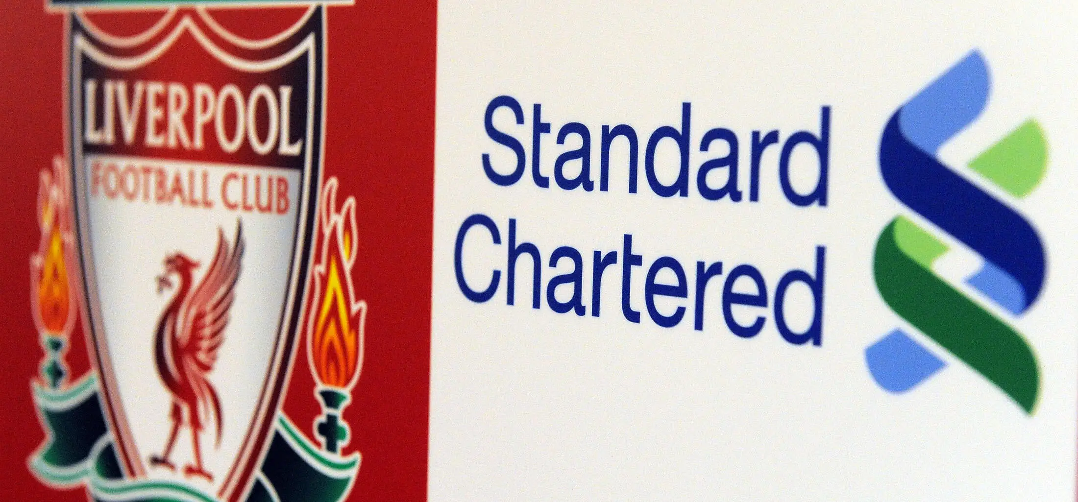 Standard Chartered have been Liverpoo's man shirt sponsor since 2010. Image: Getty