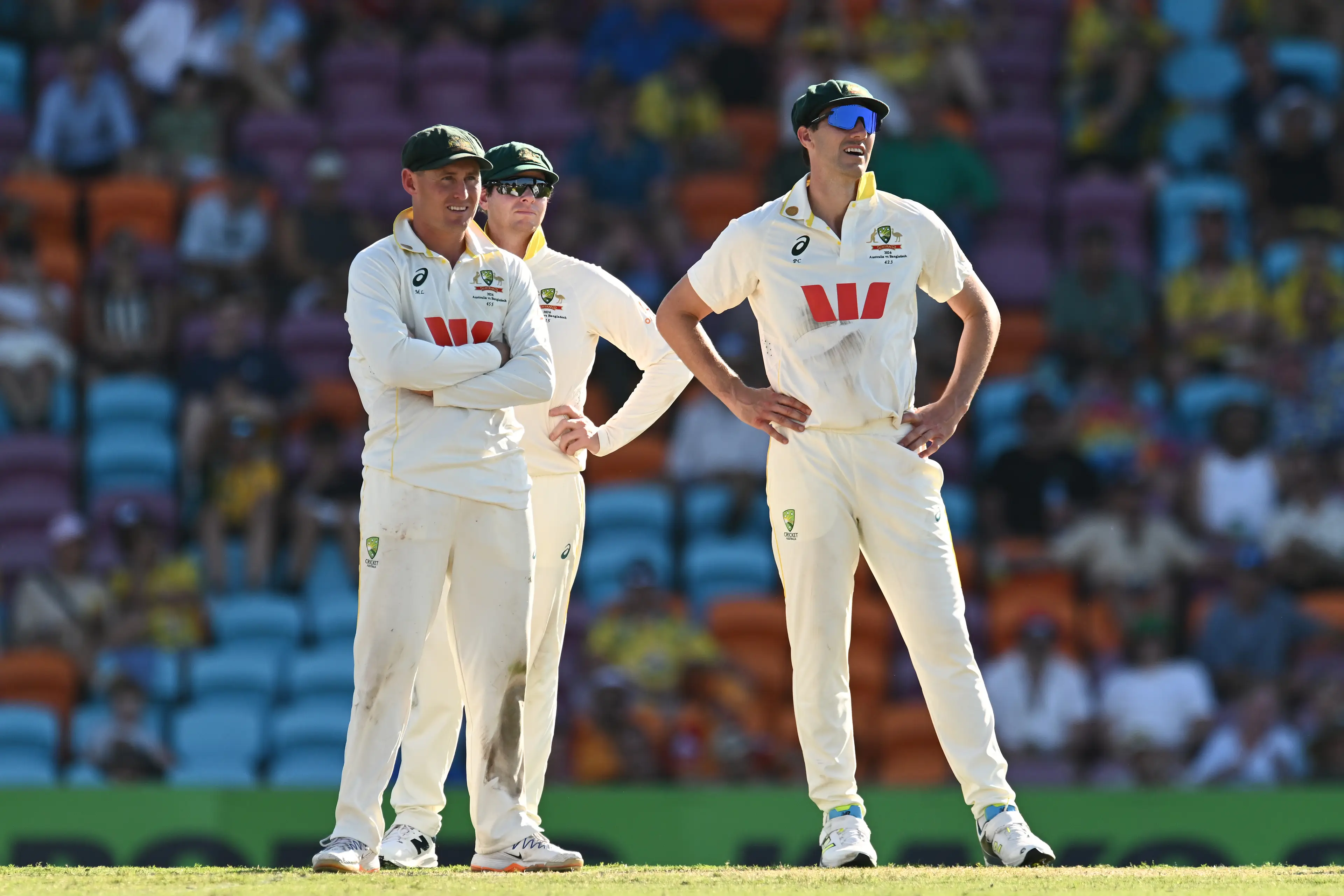 Marnus Labuschagne, Steve Smith and Pat Cummins of Australia reacts during day two of the First Test Match in the series between Australia and Bangladesh at Marrara Stadium on August 14, 2026 in Darwin, Australia. Getty Images