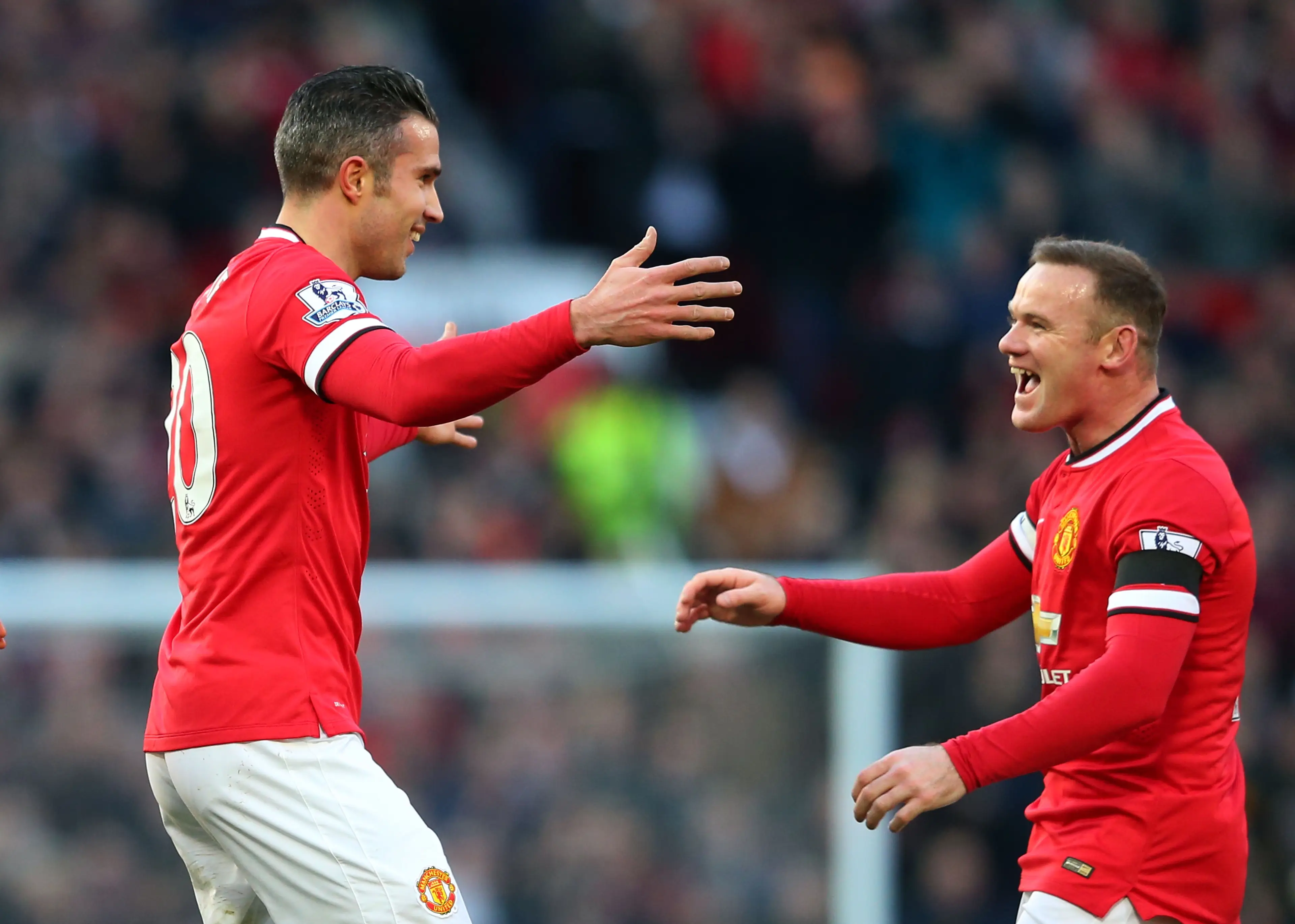 Robin van Persie and Wayne Rooney celebrate a Manchester United goal. Image: Getty