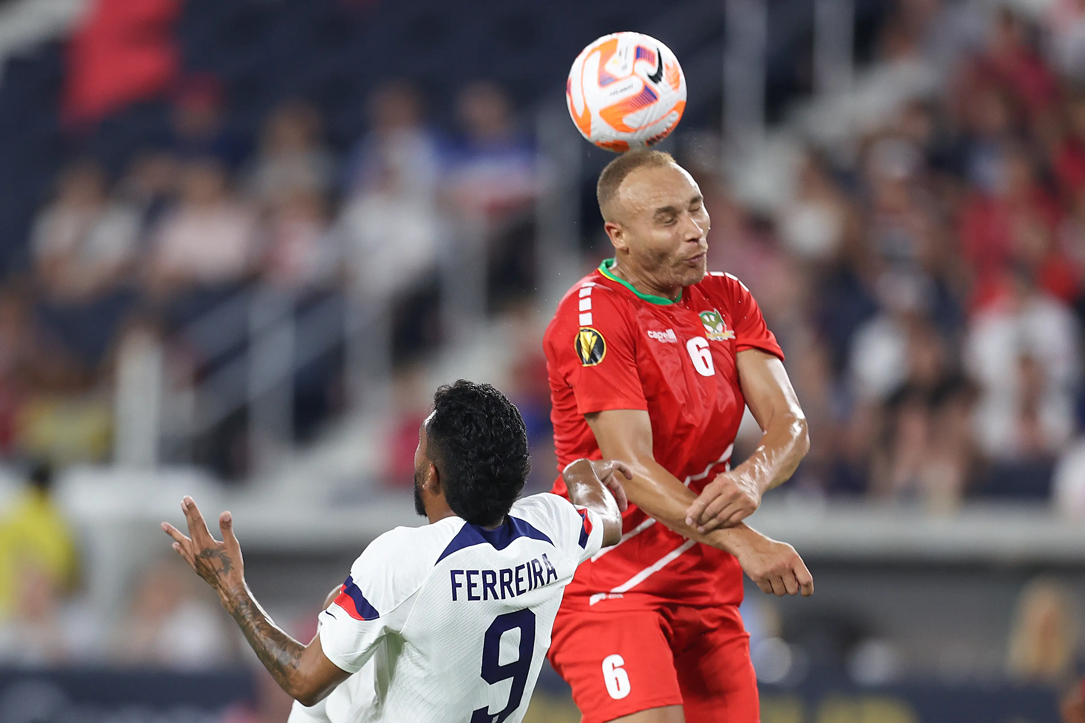 Lois Maynard competing for a header (Image: Getty)