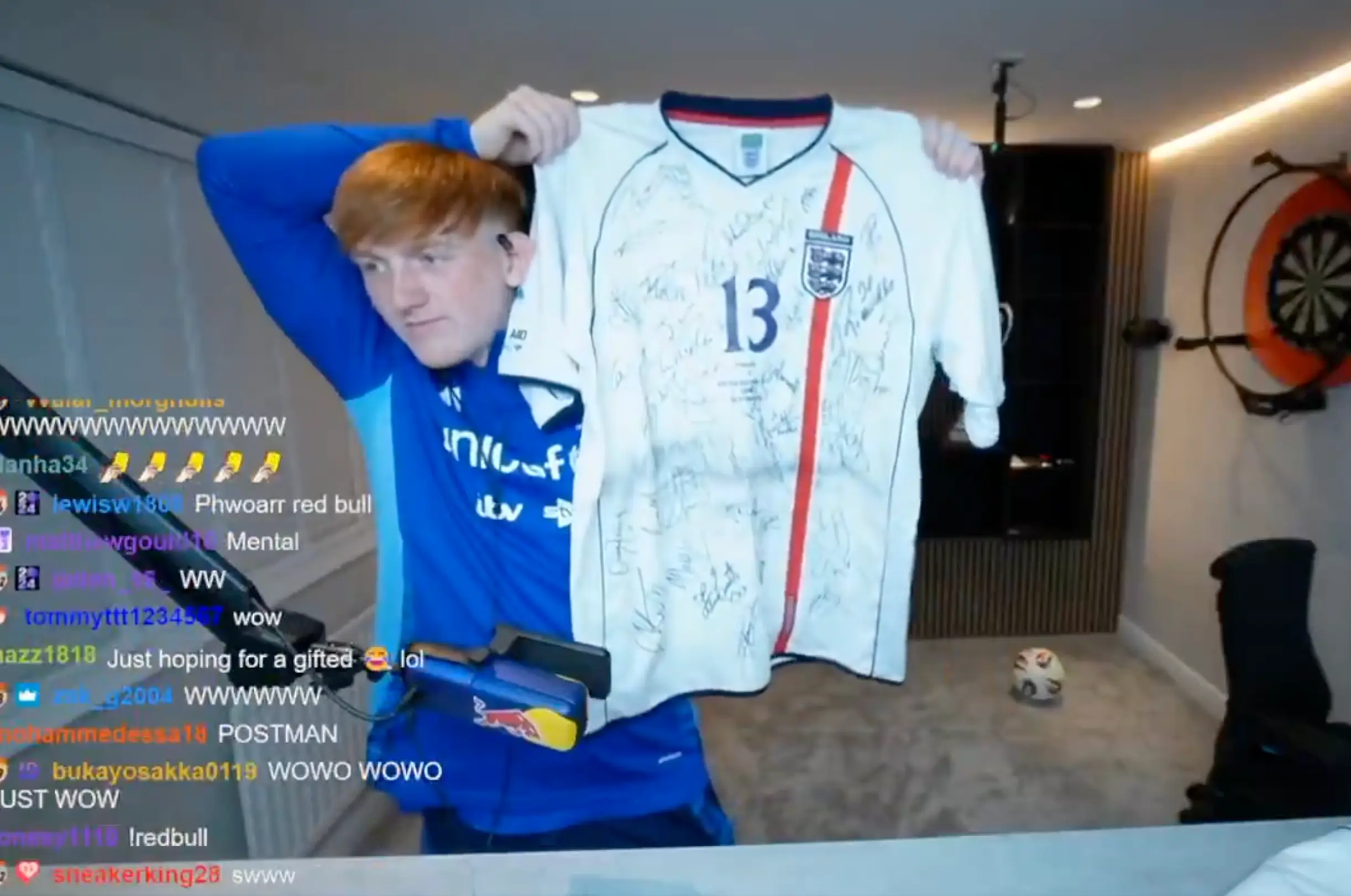 AngryGinge poses with his signed shirt. Image credit: Twitch