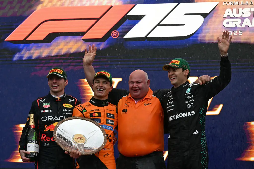 Max Verstappen (left), Lando Norris (centre right) and George Russell (right) on the Australian GP podium (Image: Getty)