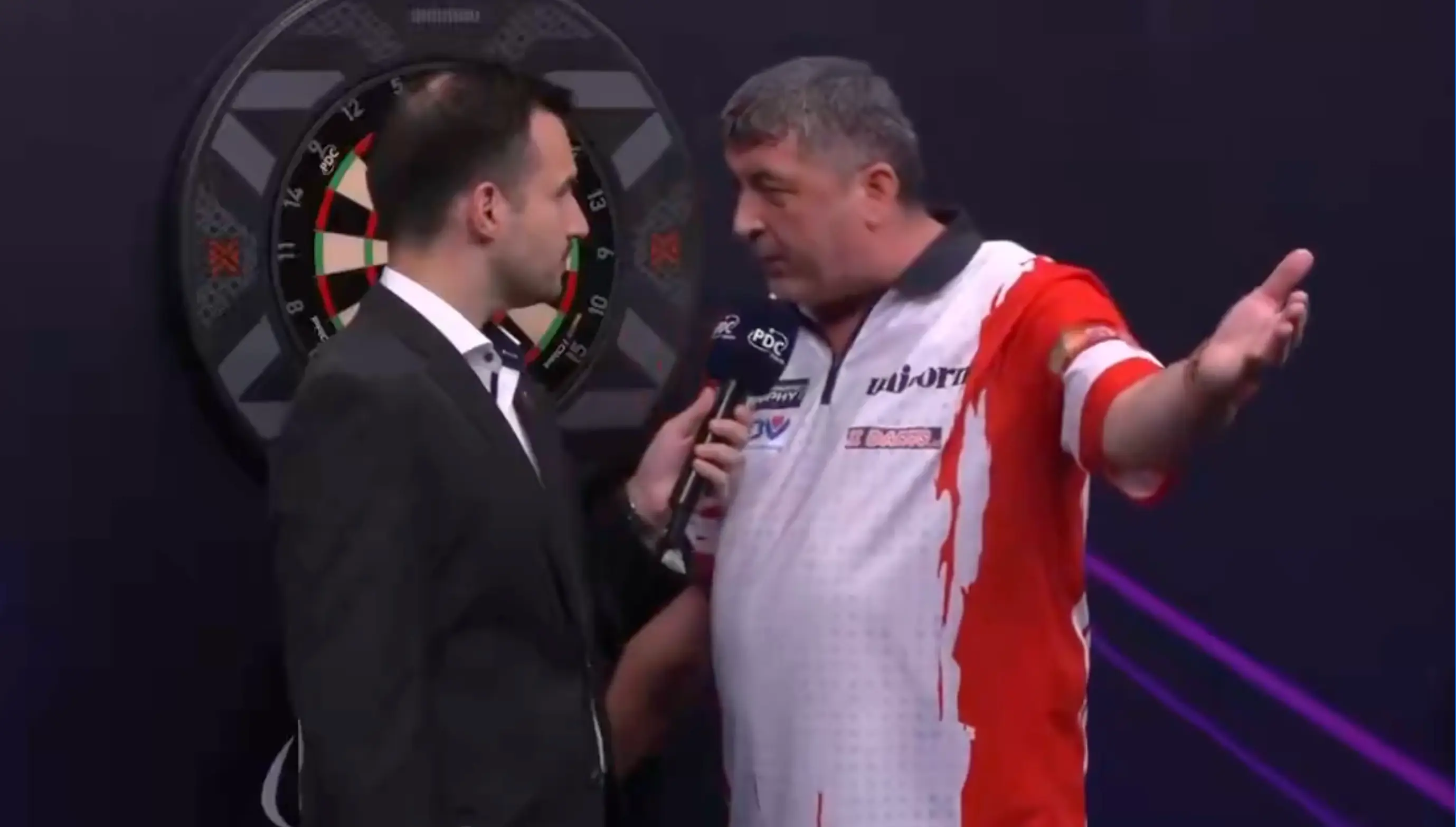 Mensur Suljovic addresses criticism from Ross Smith. Image credit: PDC
