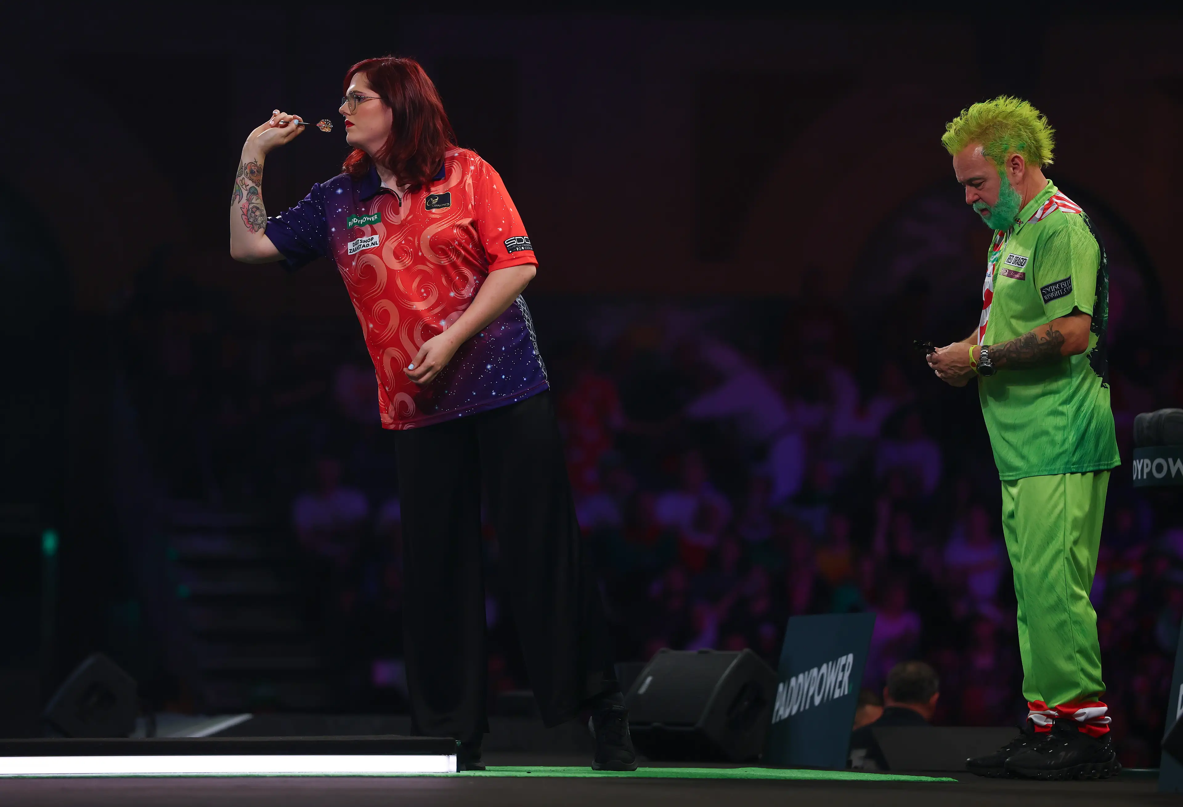 Noa-Lynn van Leuven made history as the first openly transgender woman to compete at the PDC World Darts Championship. Image credit: Getty