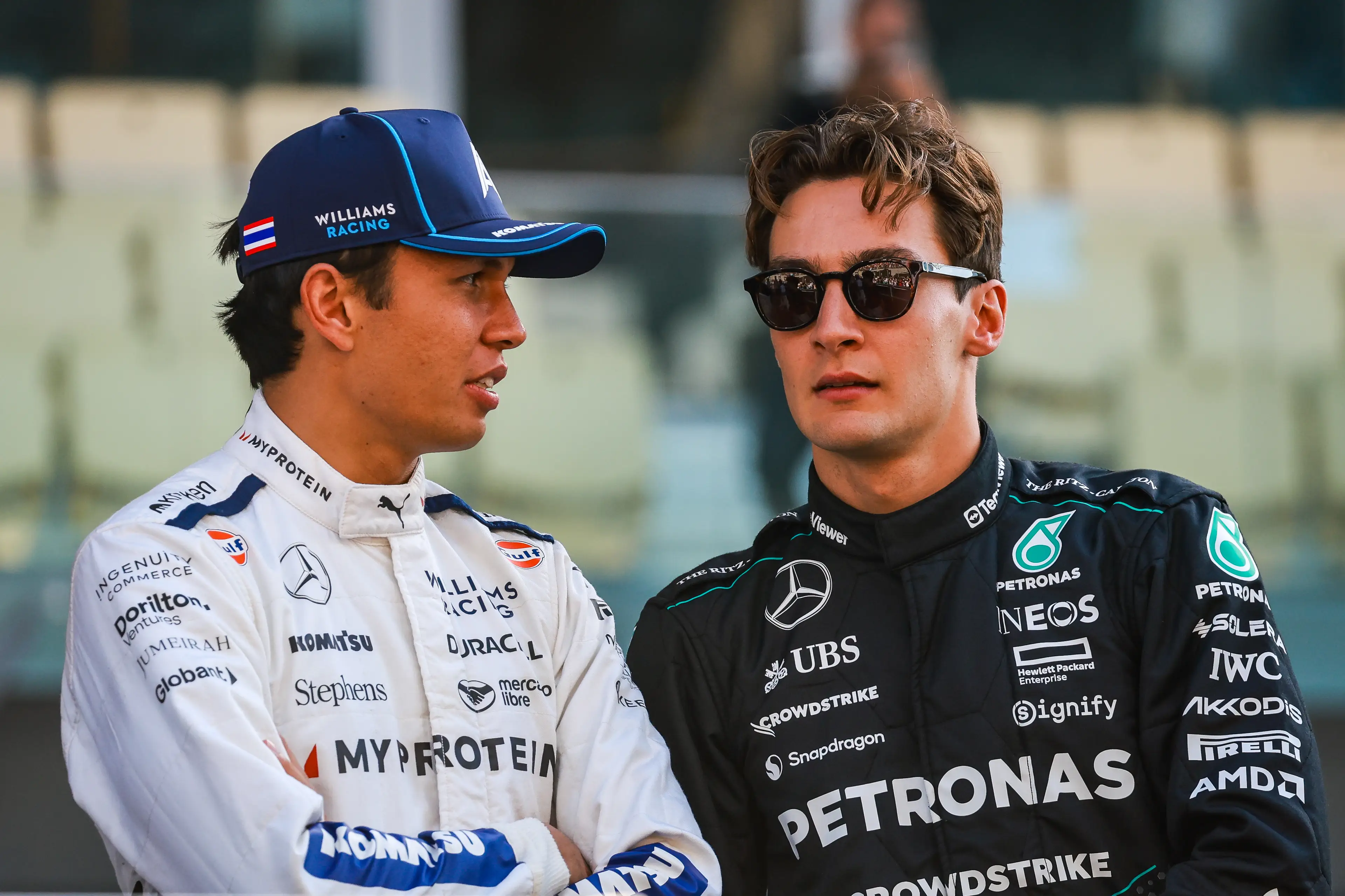 Alex Albon alongside Mercedes driver George Russell (credit: Getty)
