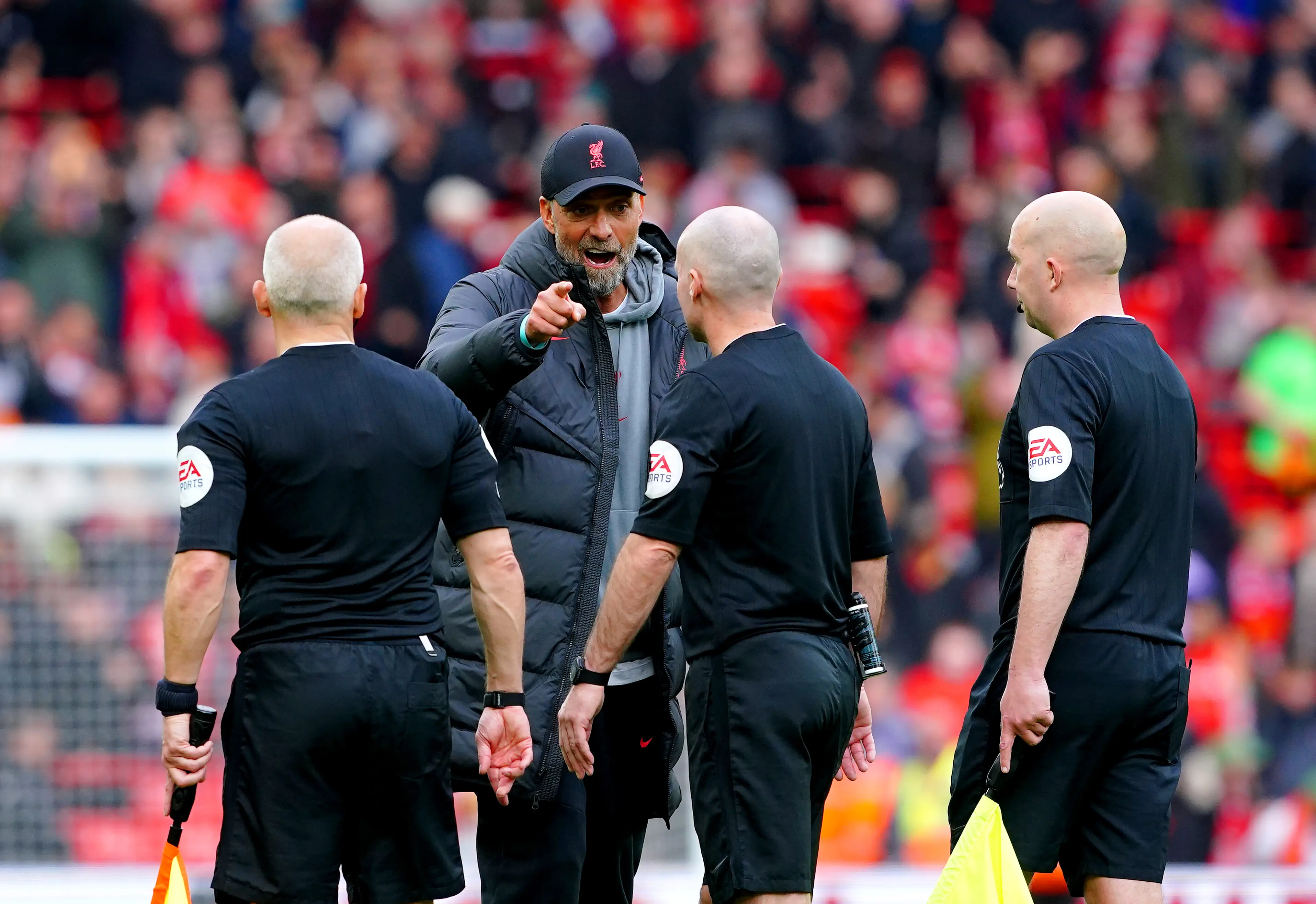 Jurgen Klopp speaks to Paul Tierney after the final whistle. Image: PA