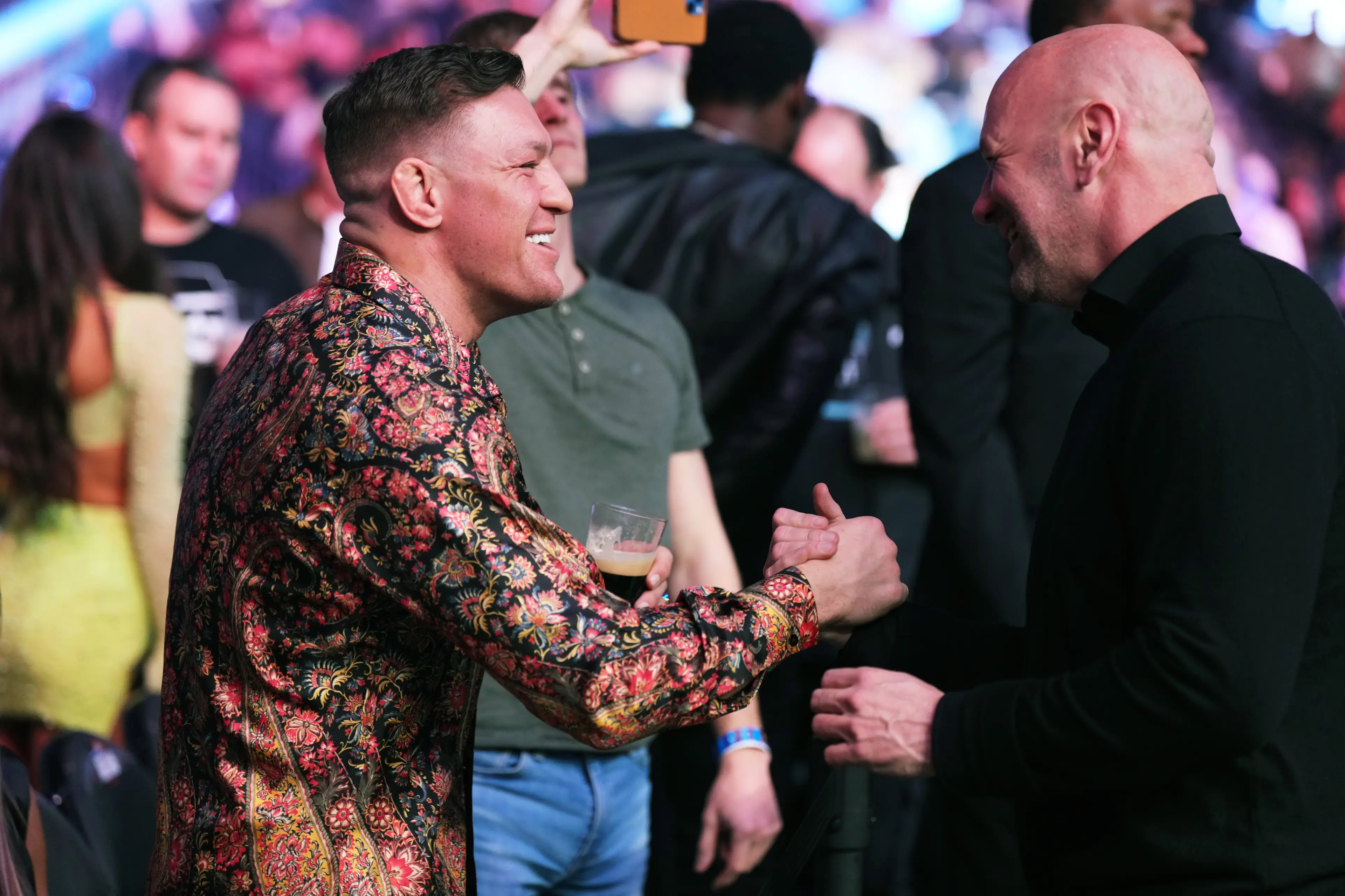 Conor McGregor and Dana White share an embrace at a UFC event. Image: Getty